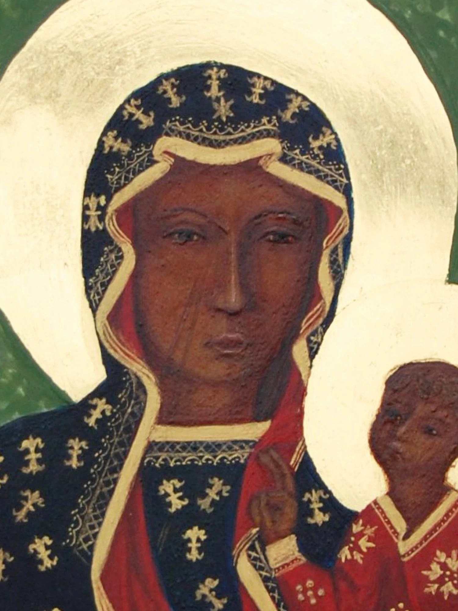 detal ikony Matki Bożej Częstochowskiej z Dzieciątkiem na zielonym tle