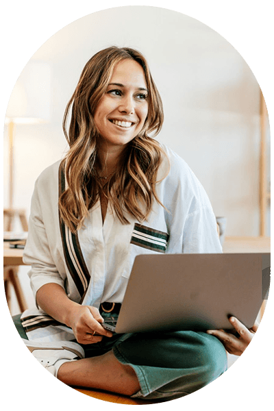 Lady smiling with laptop