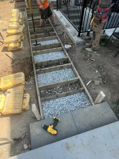 Concrete staircase layout under preparation by Falcons Landscaping team.