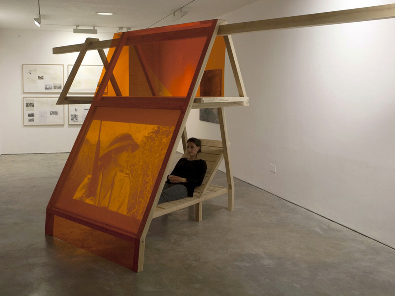 Sculptural exhibition image display seating booth