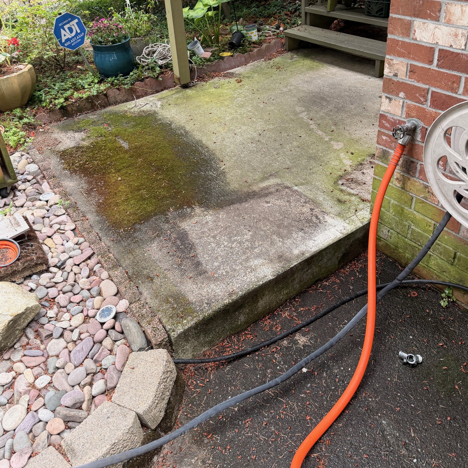 Before: concrete landing pressure washing in Seattle, WA