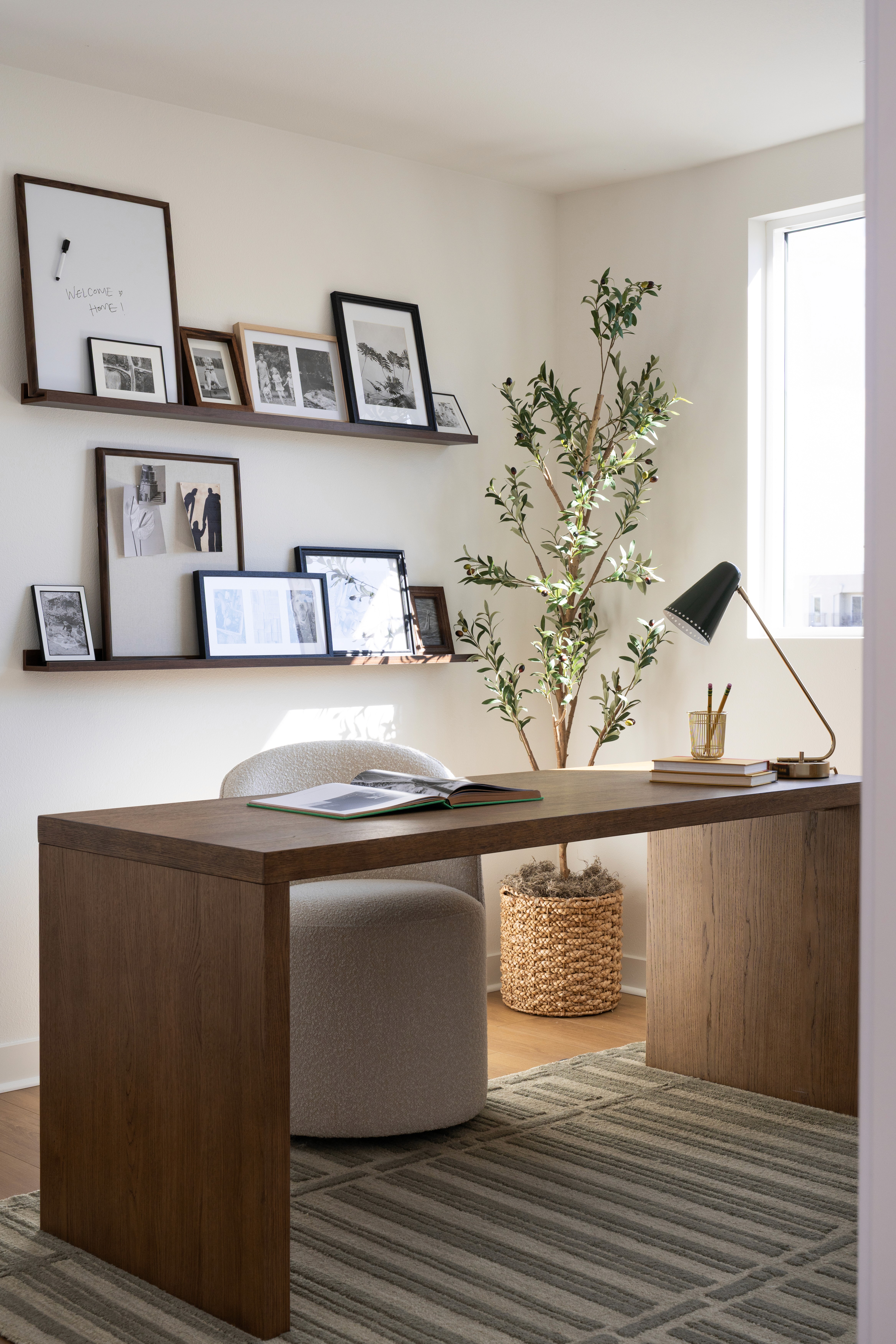 Office/Guest Room with gallery wall and tree