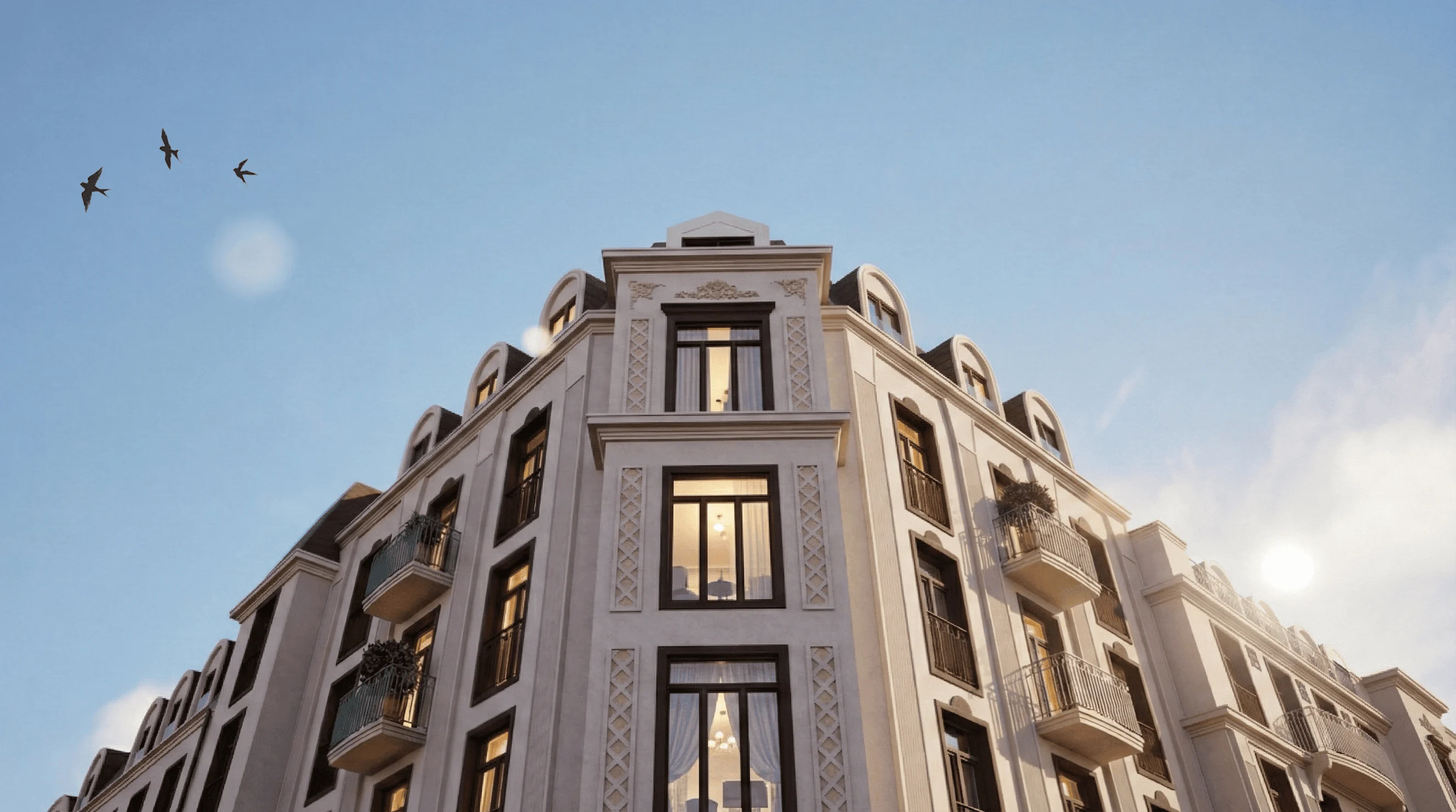 Øverste etasje i HasleHaven med buede takvinduer, terrasse og klassiske detaljer i varme materialer