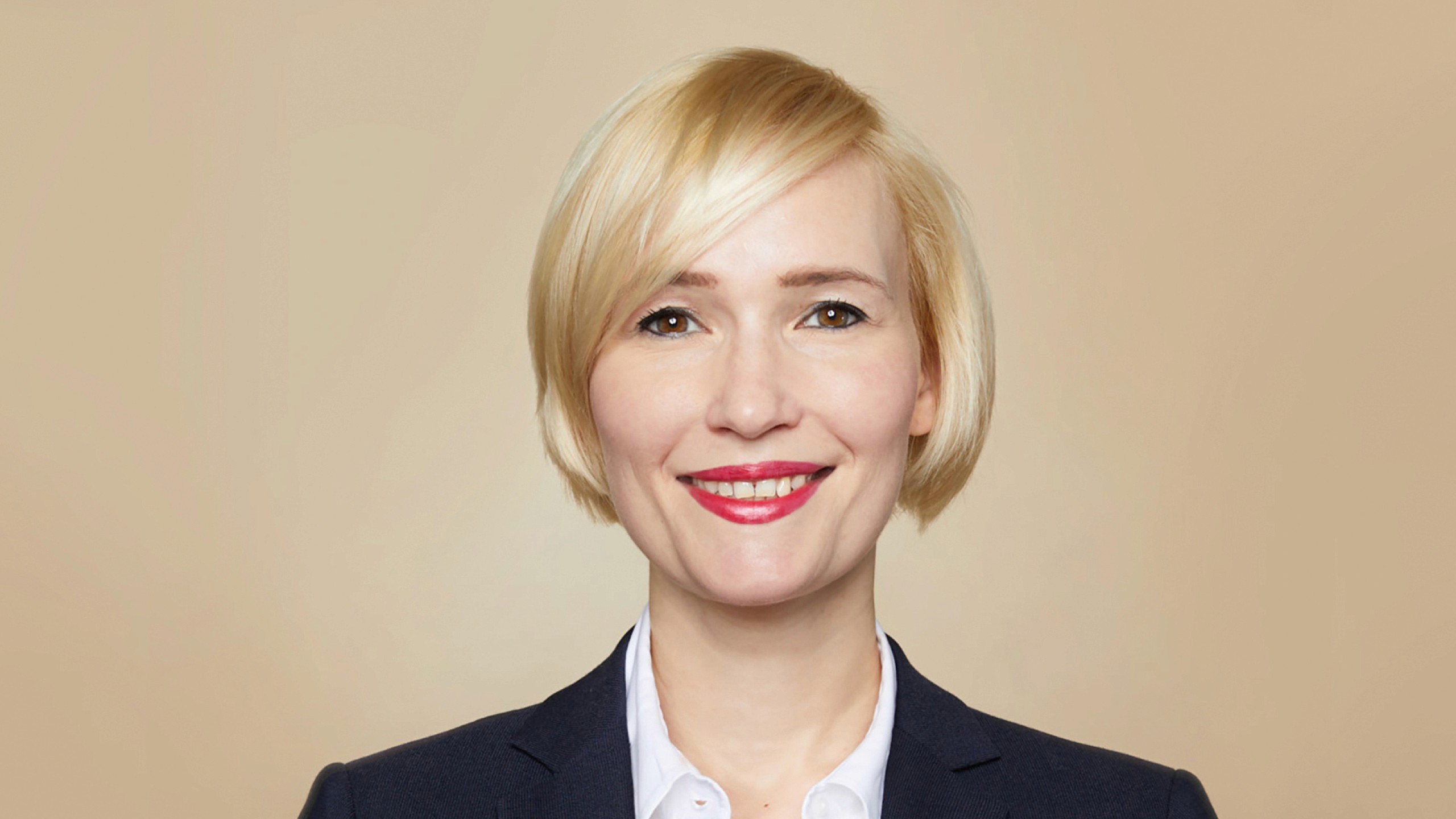 headshot of female in bright background