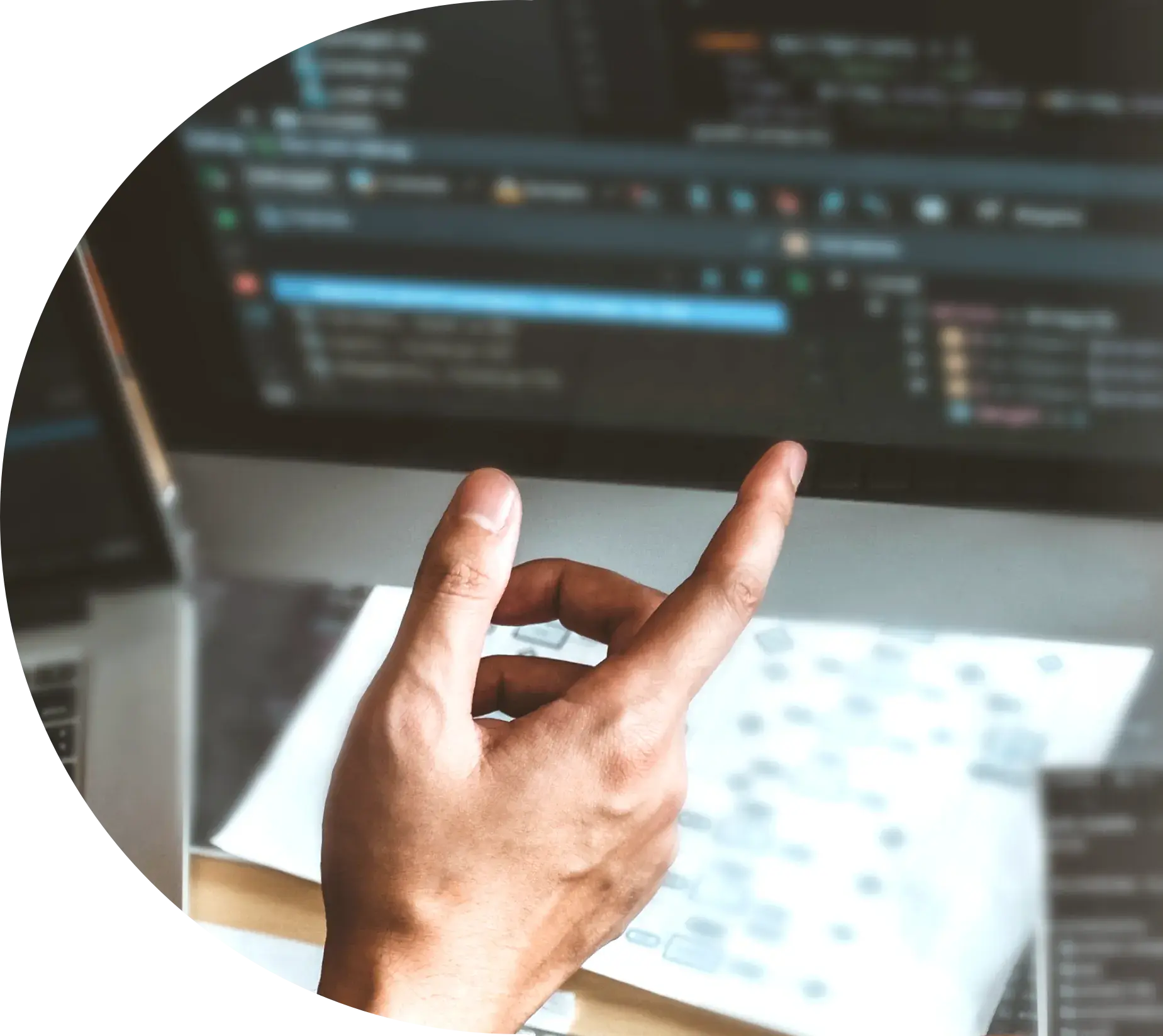 hand pointing at code