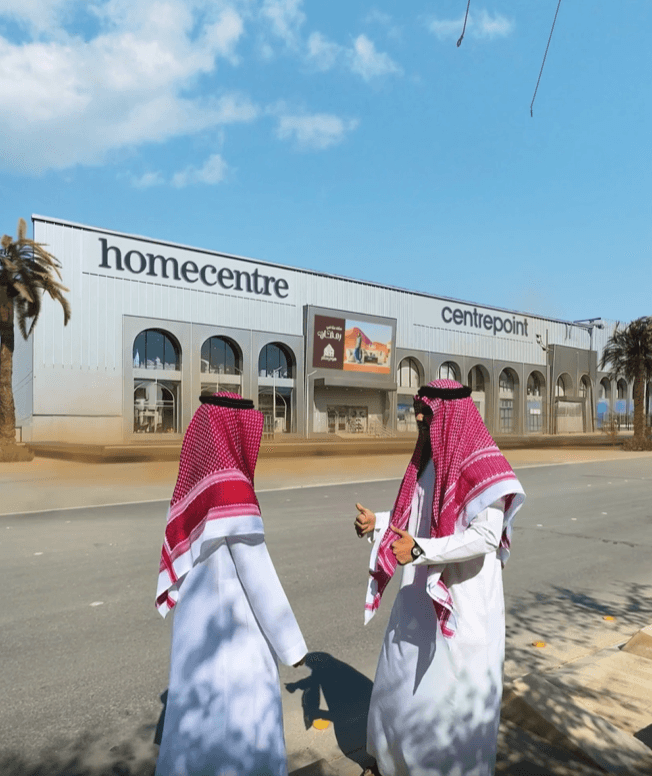 The final reveal showing the sleek Centrepoint storefront under a clear sky