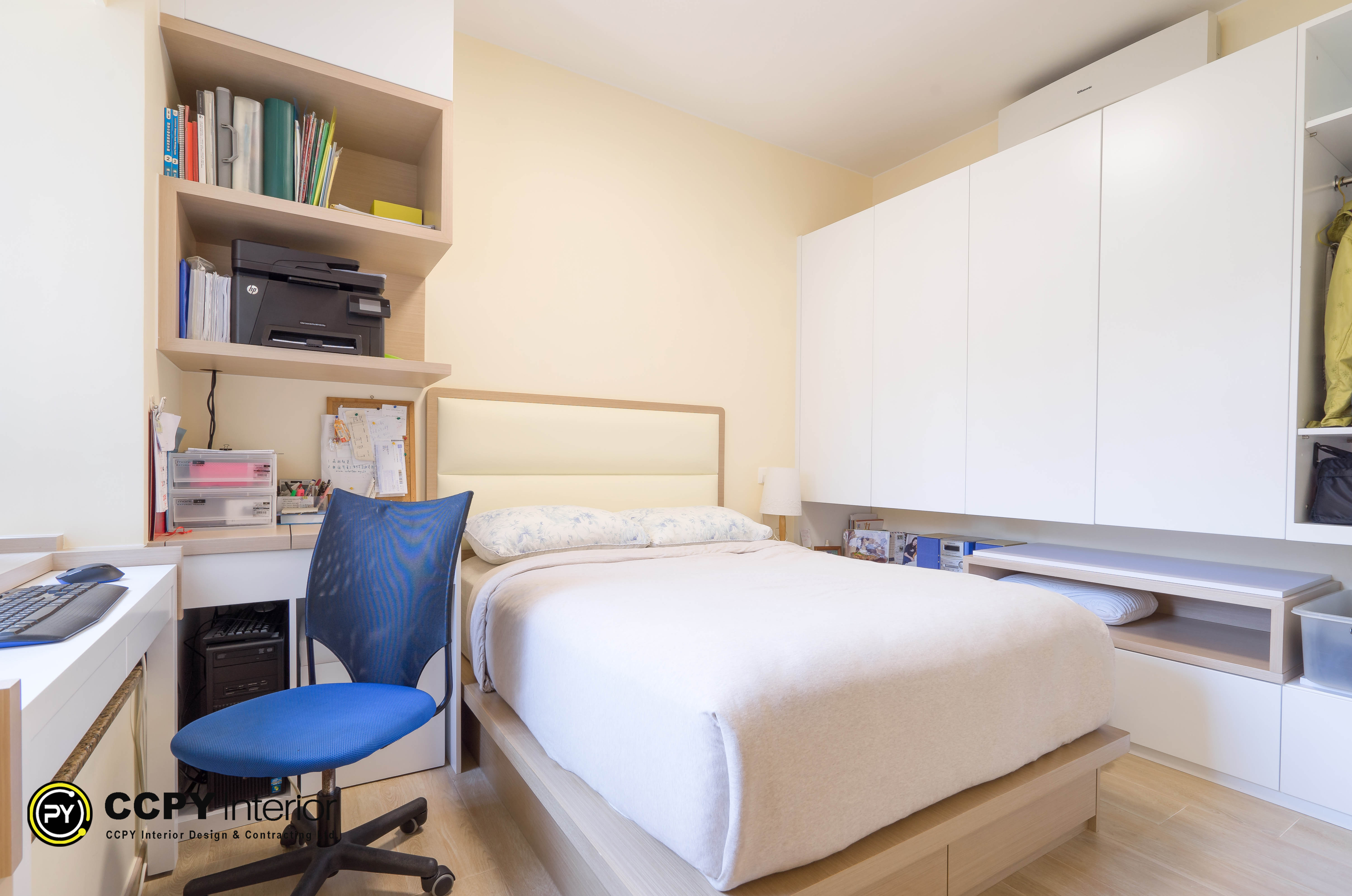 Sleek workspace and high-gloss white wardrobes demonstrate superior functional planning in a Castello Block3 home.