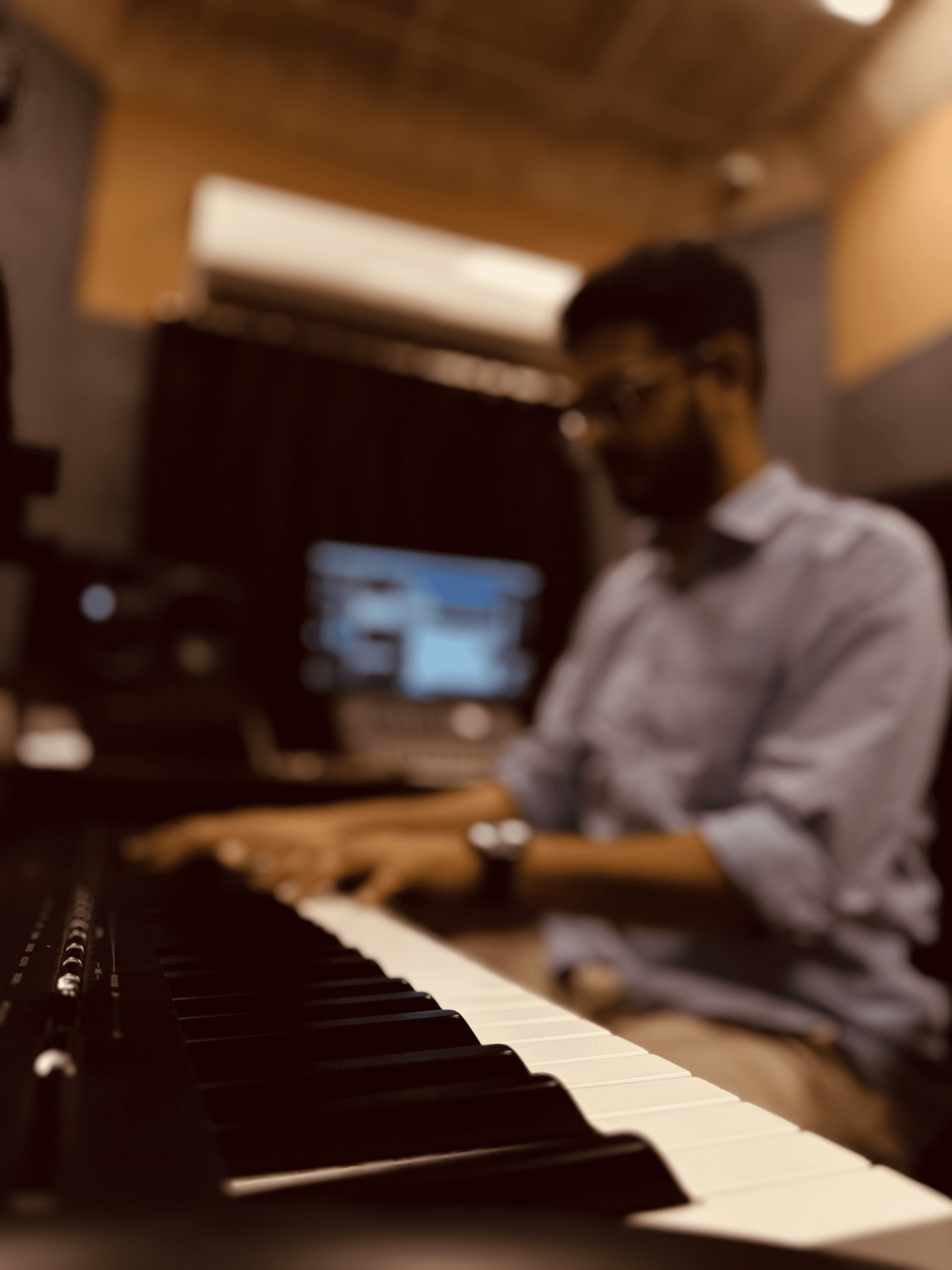 Music Producer sitting at his desk