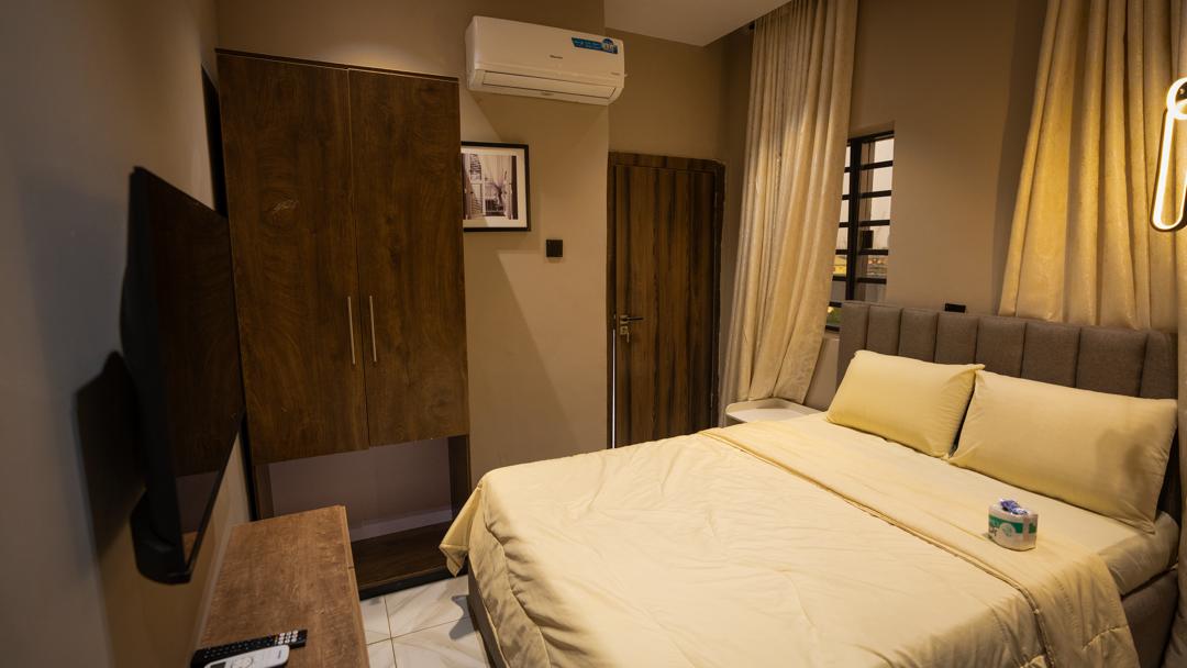 Spacious bedroom interior at Urban Suites, modern shortlet apartment in Surulere, Lagos