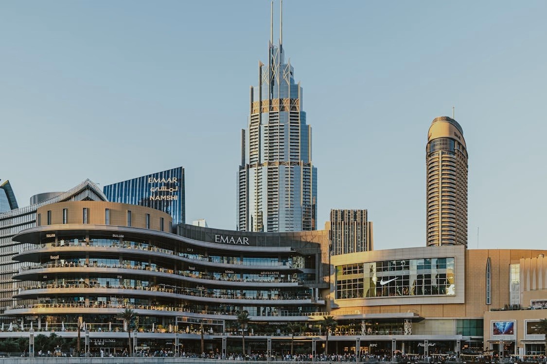 Exterior view of Dubai Mall with crowds shopping as a popular indoor activity.
