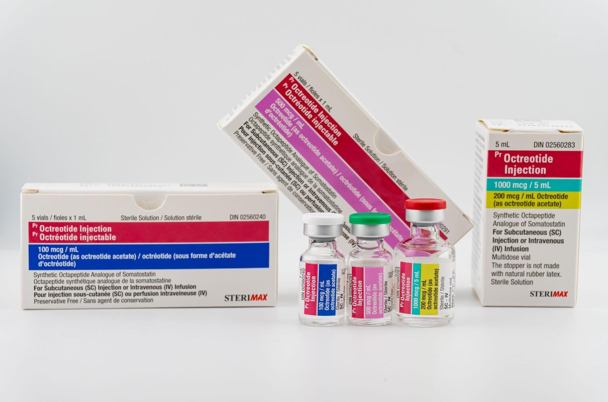 An assortment of SteriMax Octreotide Injection products, featuring three boxes and three corresponding vials in strengths of 100 mcg/mL, 500 mcg/mL, and 1000 mcg/5 mL.