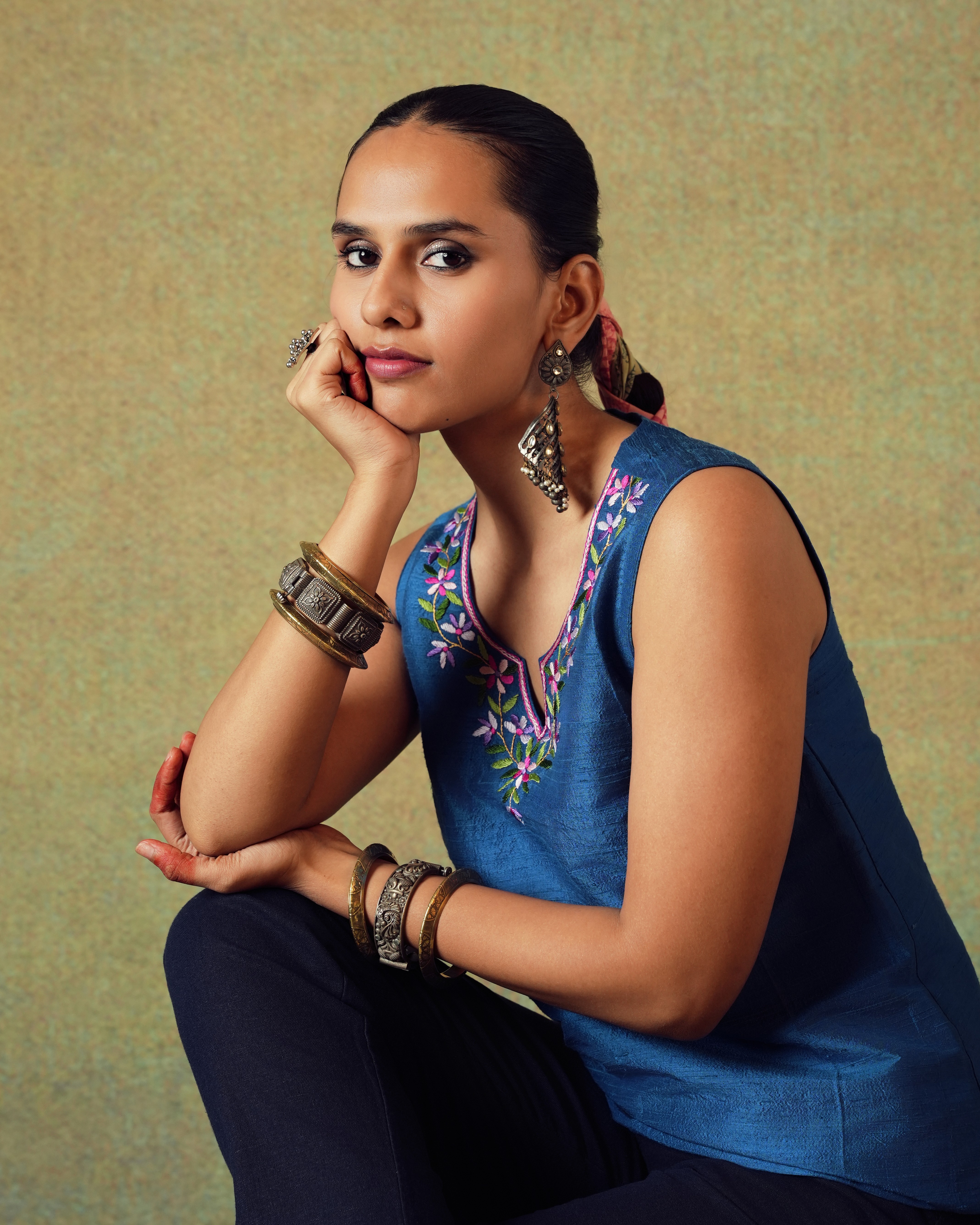 Friends laughing and posing inside a car