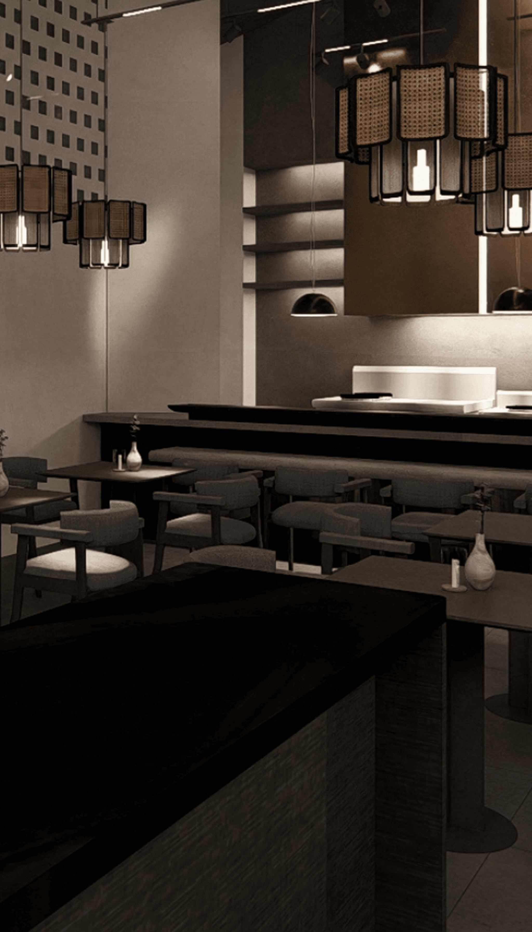 Plate with a seared salmon fillet topped with green herb garnish and sauce, served on a white dish placed on a dark green marble table beside a white candlestick.