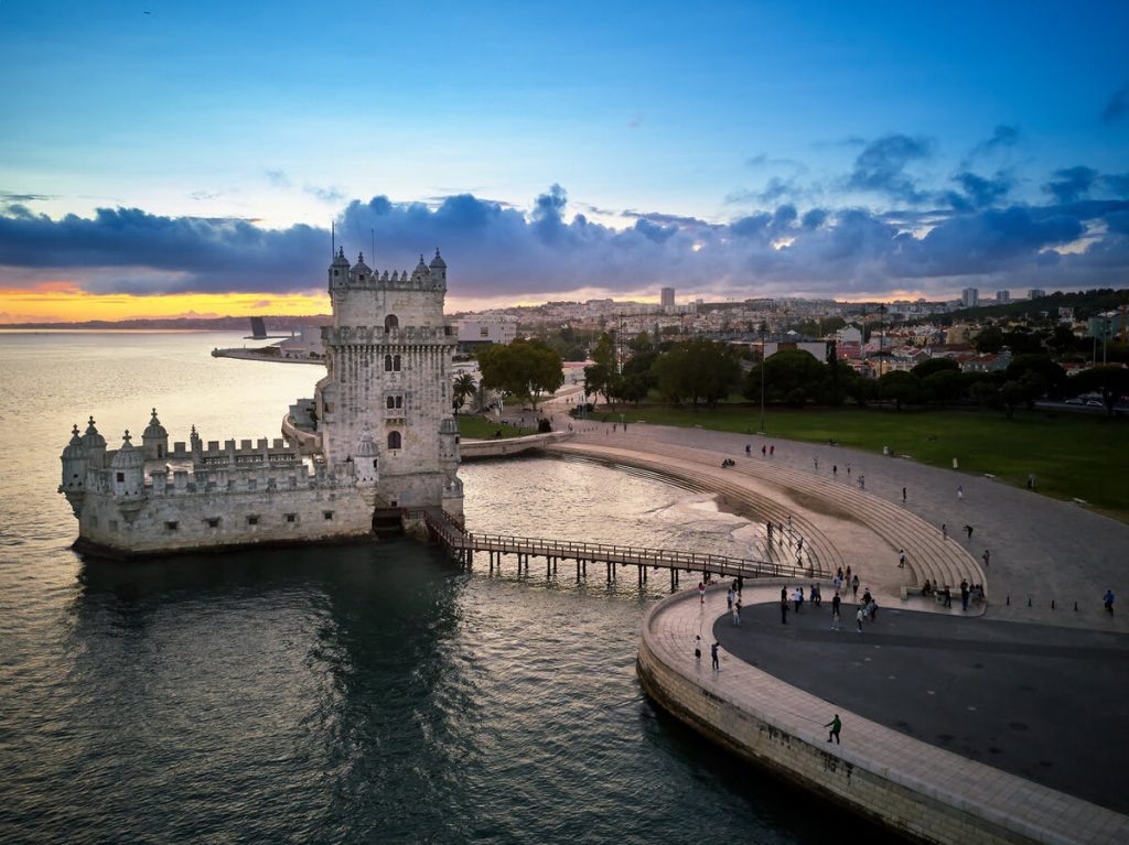 a view of a city with a large body of water in the background