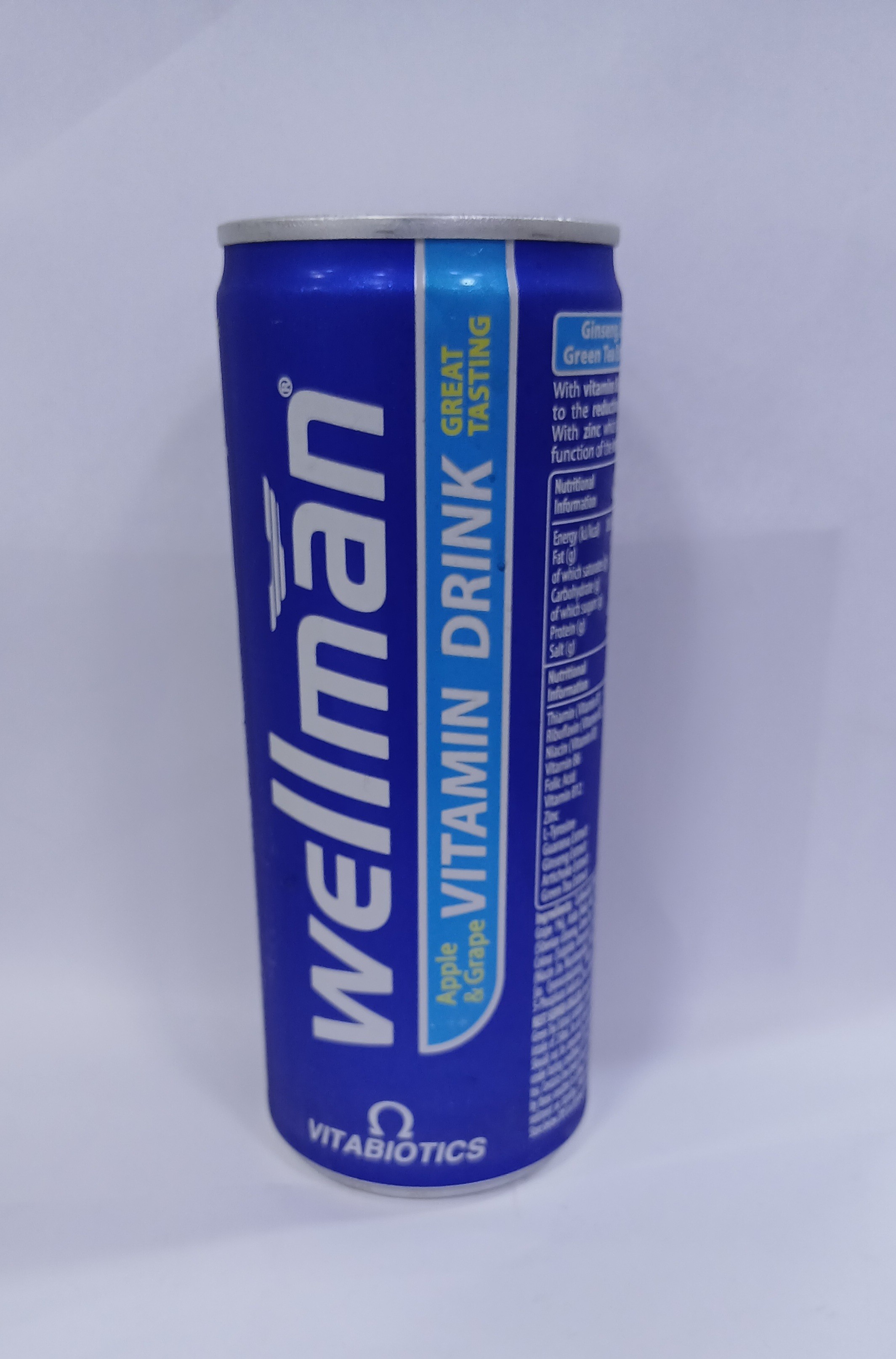 Wellman Vitamin Drink 250ml pre-mixed powder in blue and white canister packaging.