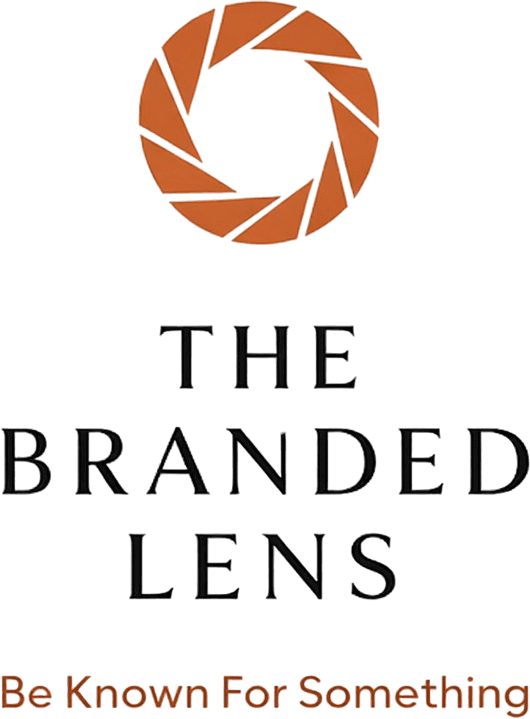 Lens icon with the business name "The Branded Lens" as a heading underneath with the subheading tagline "Be Known For Something" written underneath