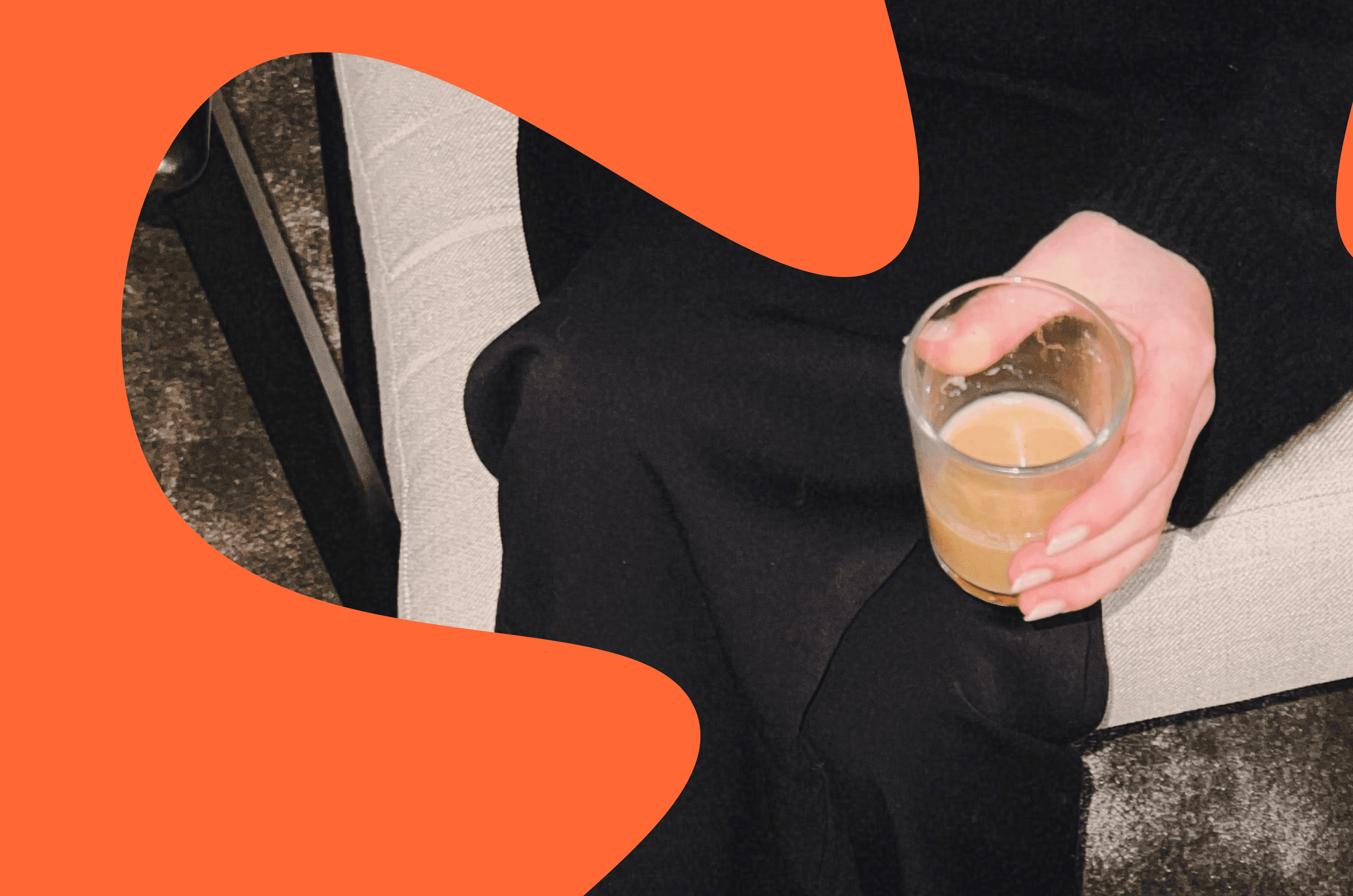 Close-up of a person seated and holding a small glass of coffee, partially framed by bold graphic shapes — representing personal branding in 2026, where everyday moments, human details, and confident self-expression shape authentic B2B visibility.