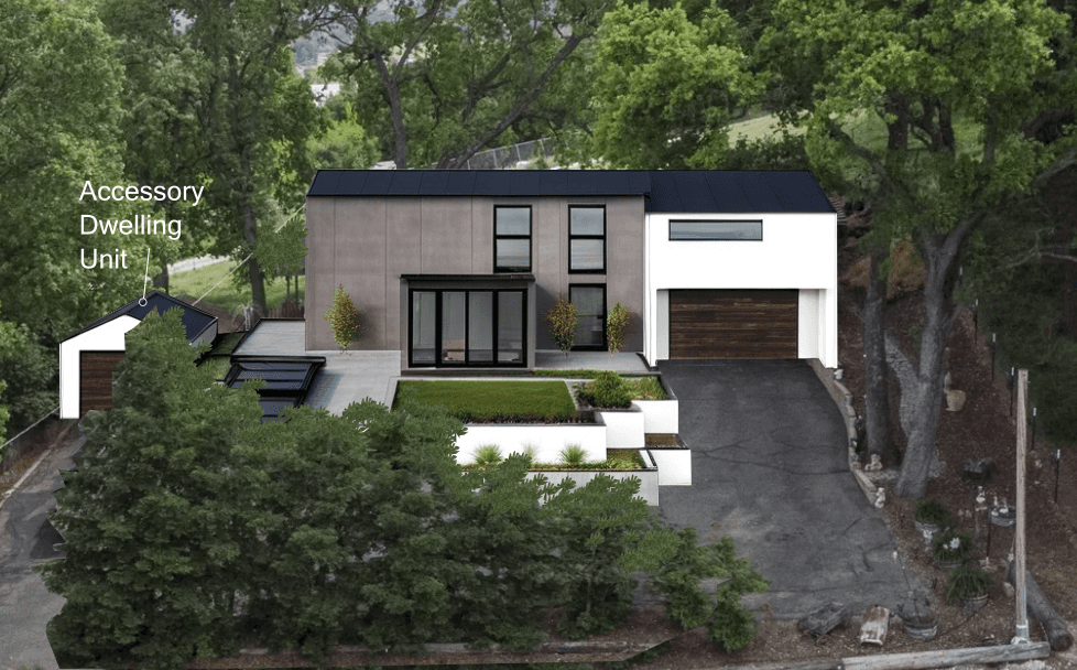 Living room with a fireplace and a view of the pool