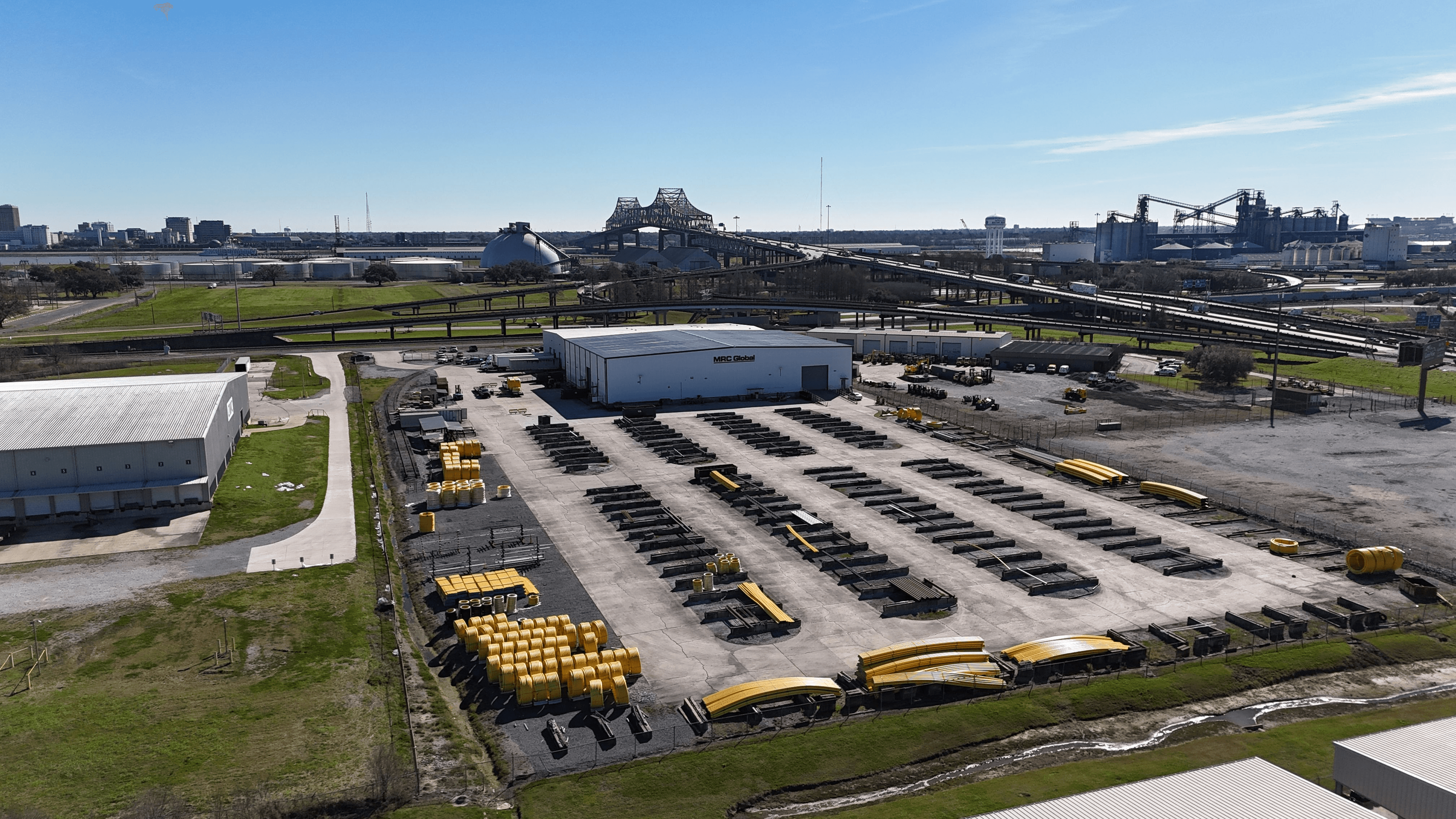 Closer aerial view of the MRC Global Port Allen storage yard and warehouse facility.