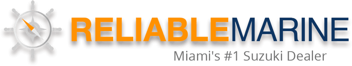 A smiling woman with her arms crossed, standing against a dark green background. She has long, dark hair.