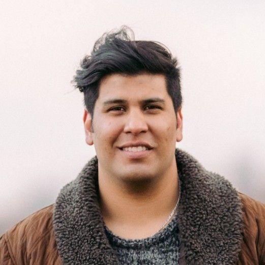 Man smiling in an office