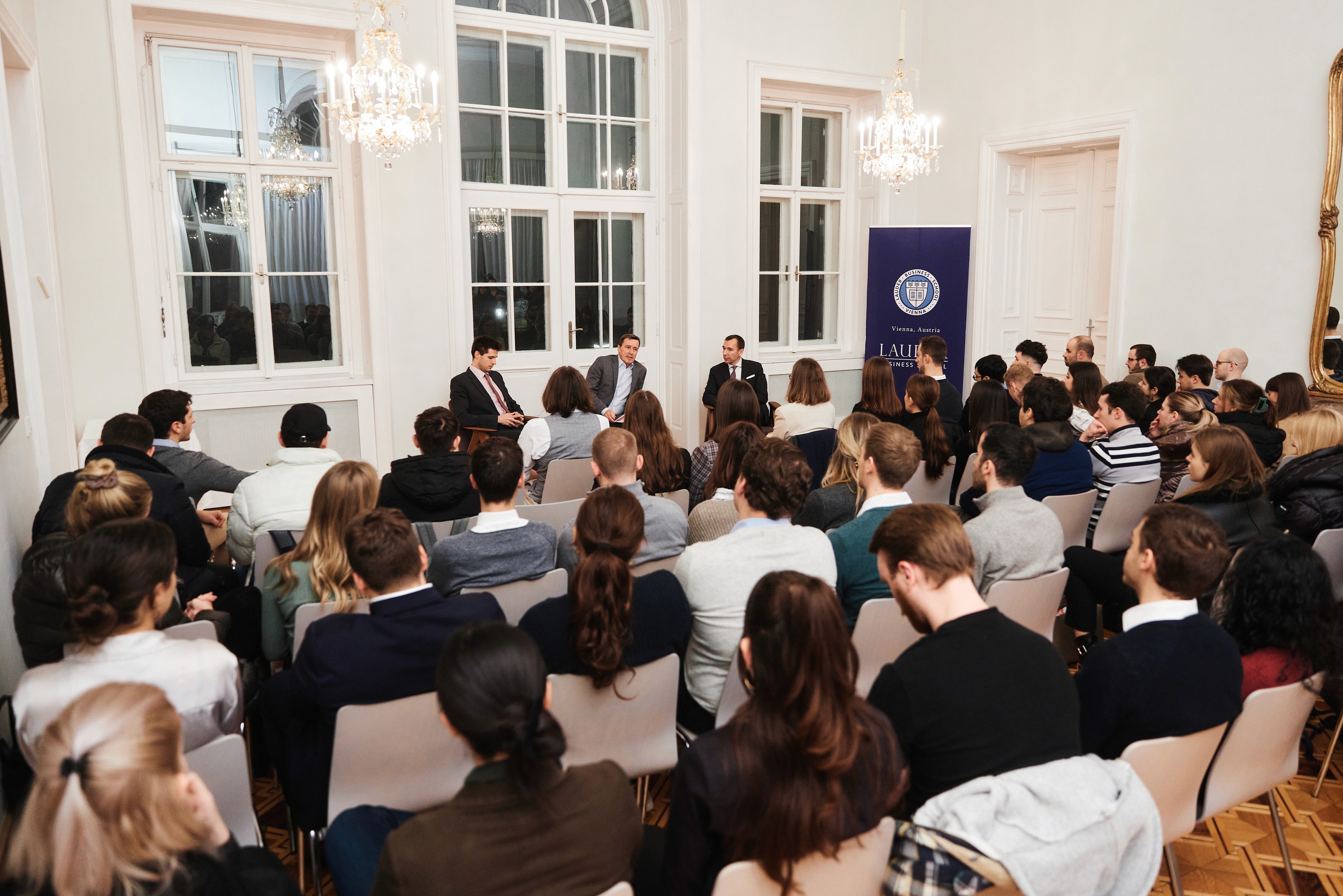  Mag. Roland Schöbel, Partner and Member of the Territorial Leadership Team at PwC Austria talking to LBS students