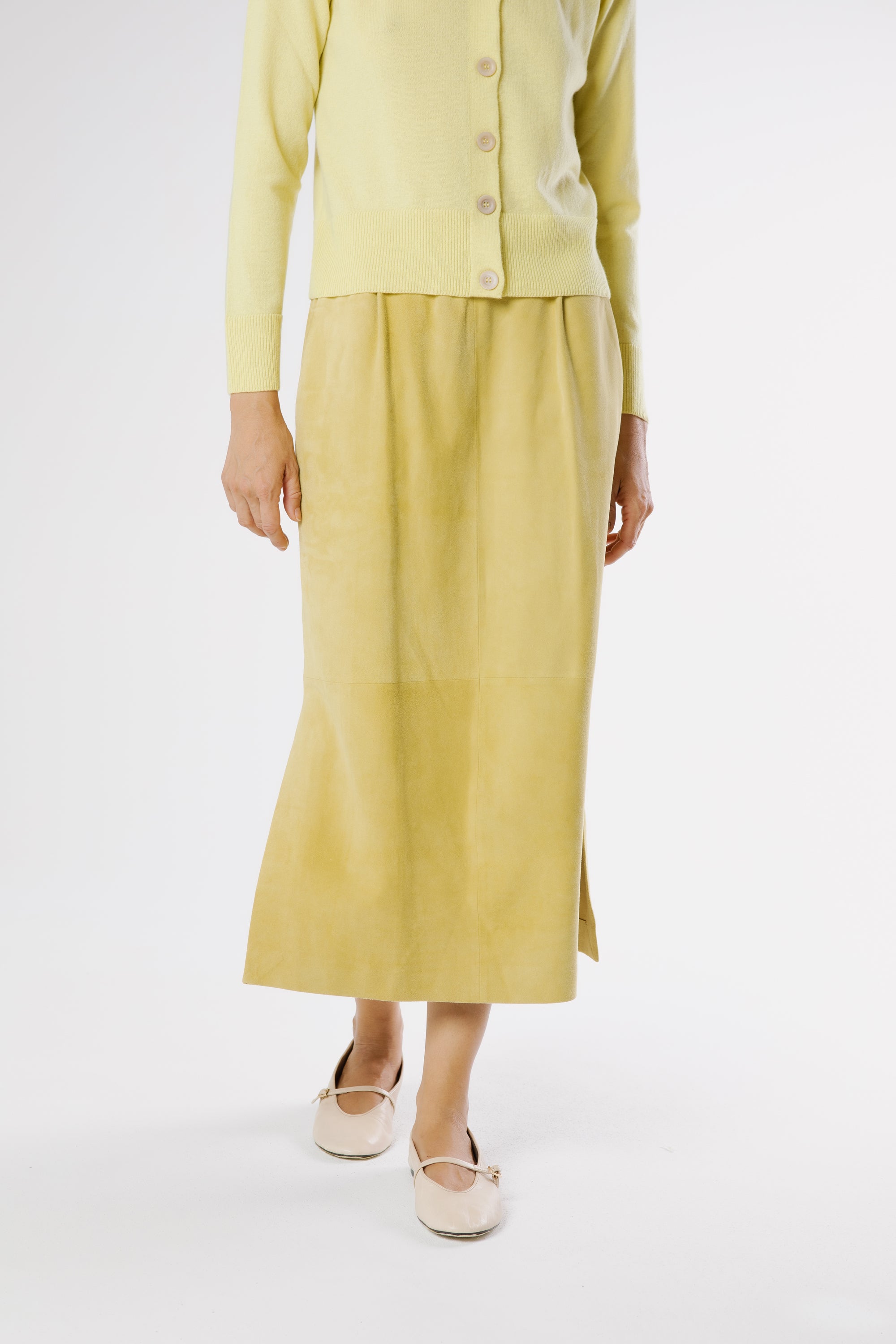 Elasticated waistband detail of Lemu suede midi skirt
