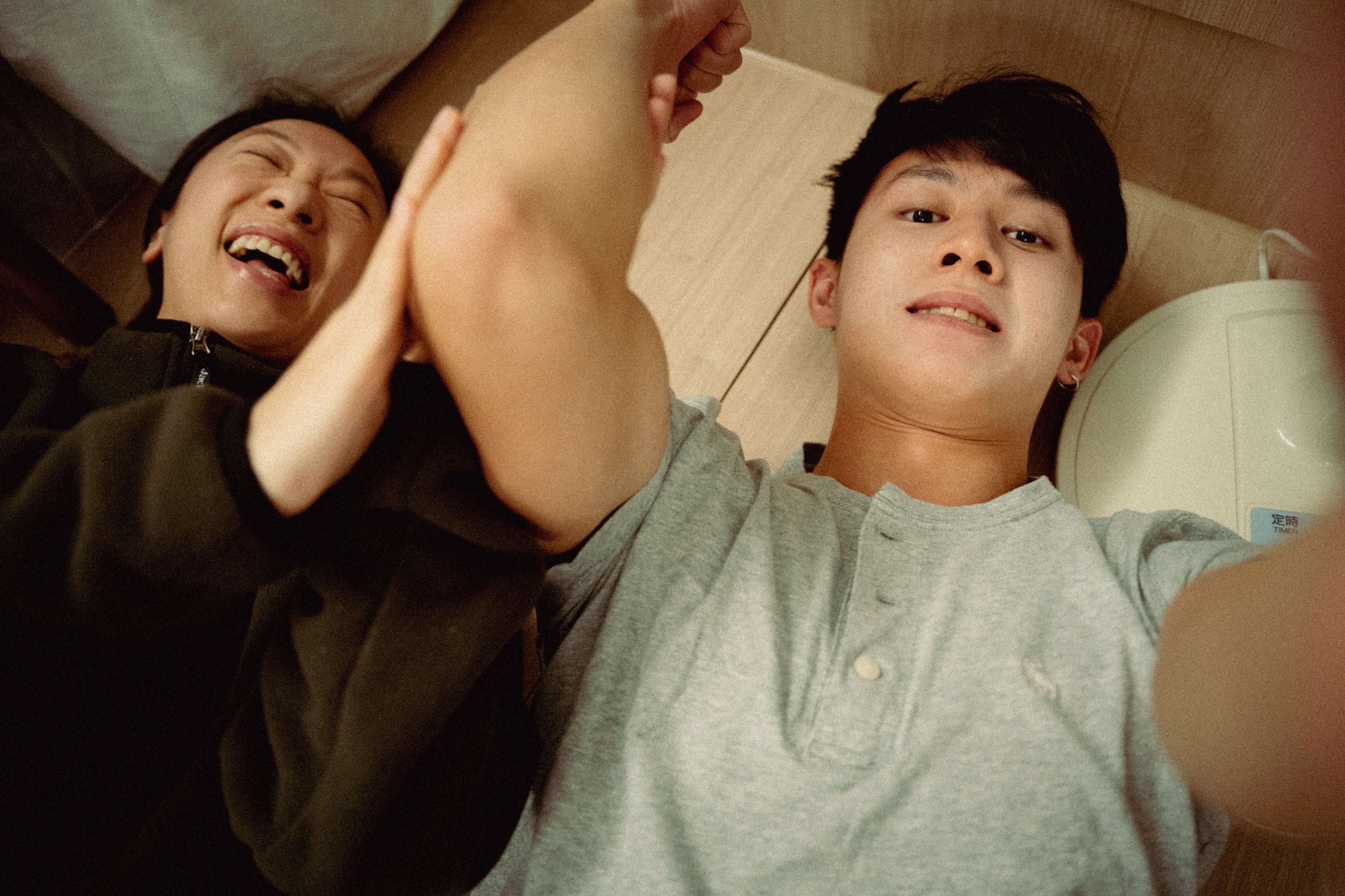 close up of the sister wearing her brother's jacket