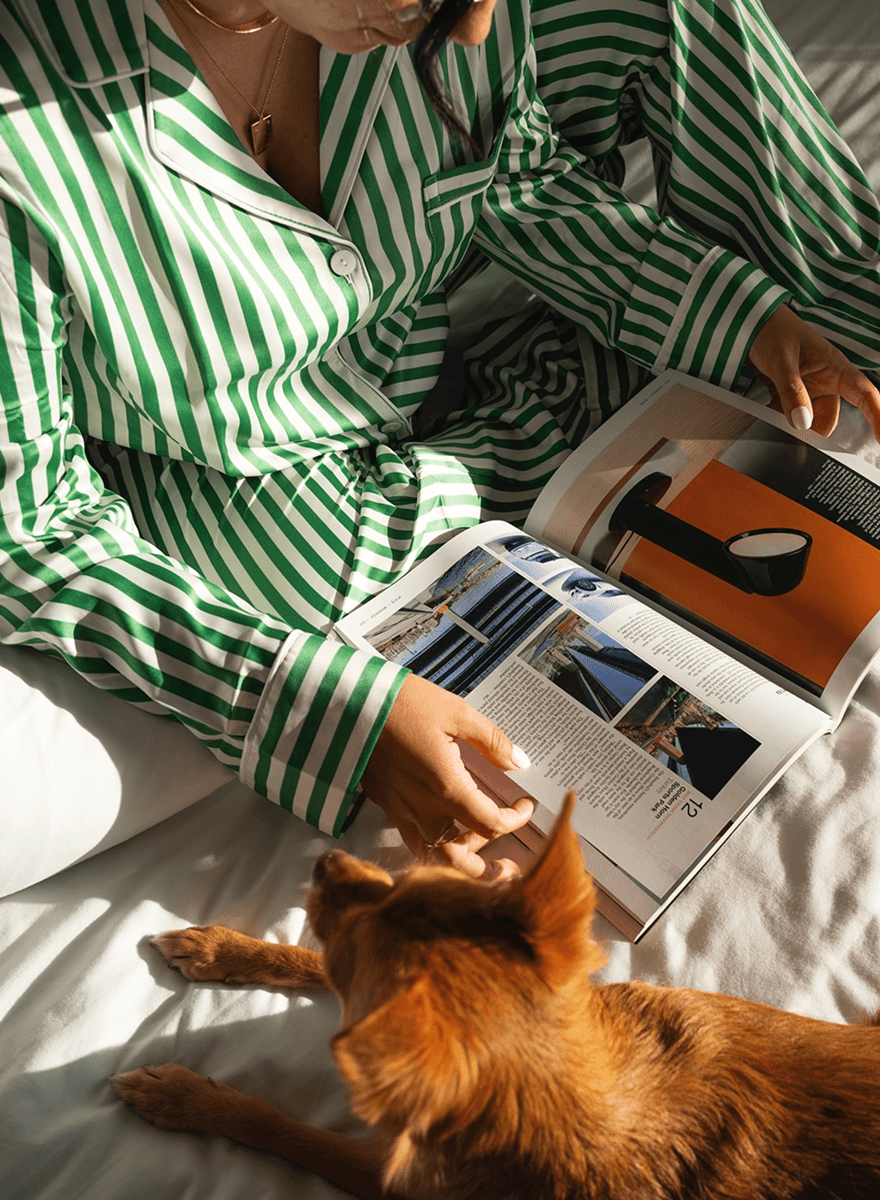 A long, empty hallway with red light accents.