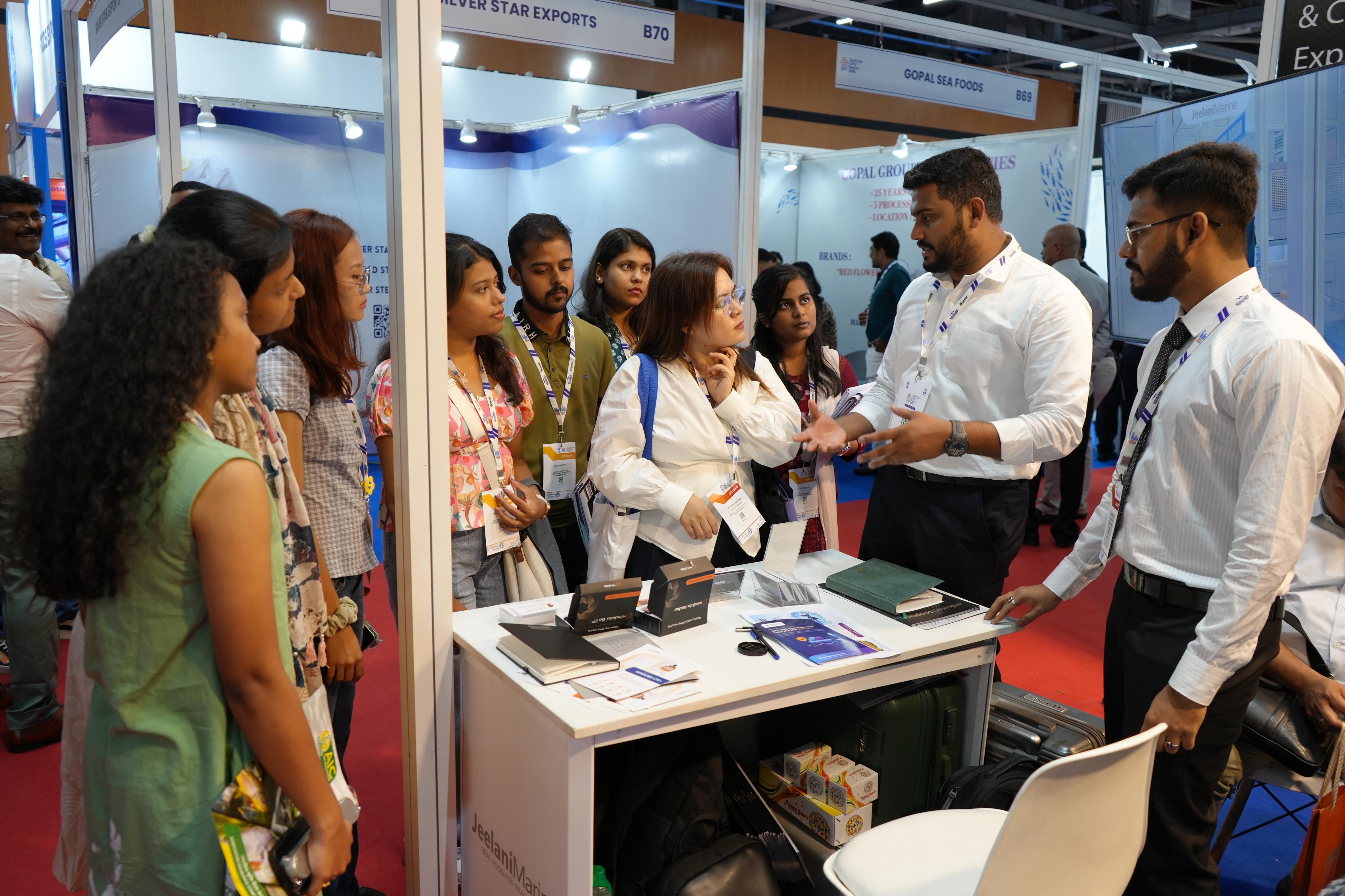Swalahudheen PK interacting with visitors at the Jeelani Marine Products booth during Seafood Expo Bharat