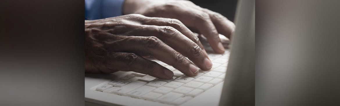 Someone submitting an obituary online