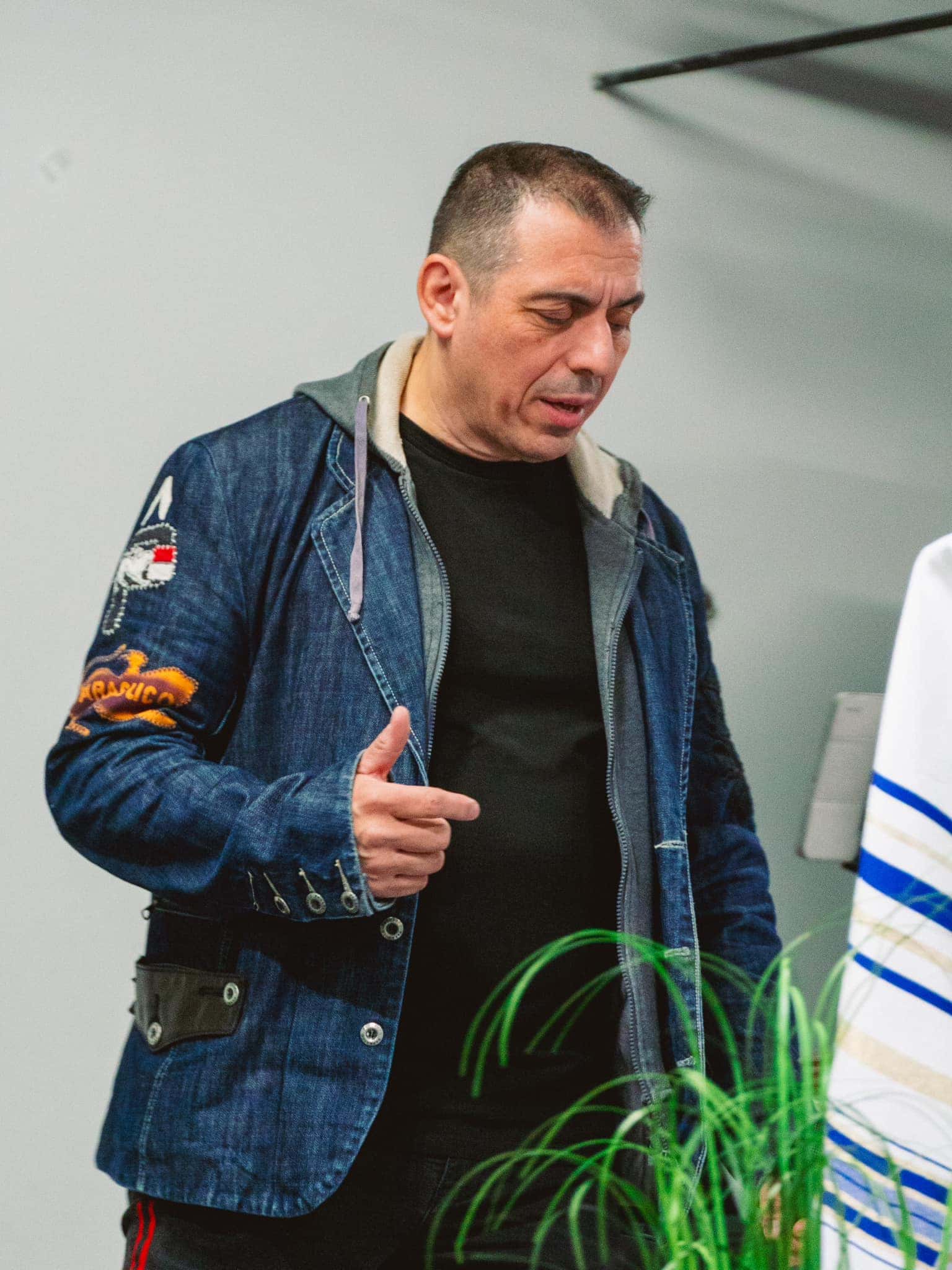 Close-up of a tree stump showing growth rings and a textured brown wood surface.