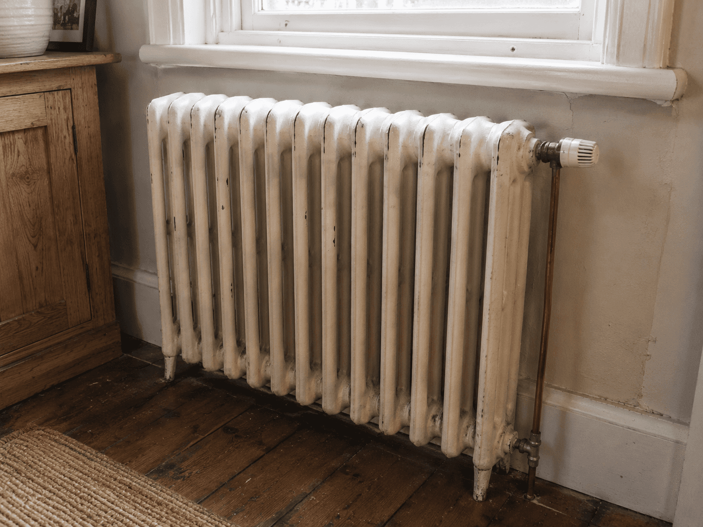Cast iron radiator fitted in a Birmingham family home where the heat pump was running at an unnecessarily high flow temperature