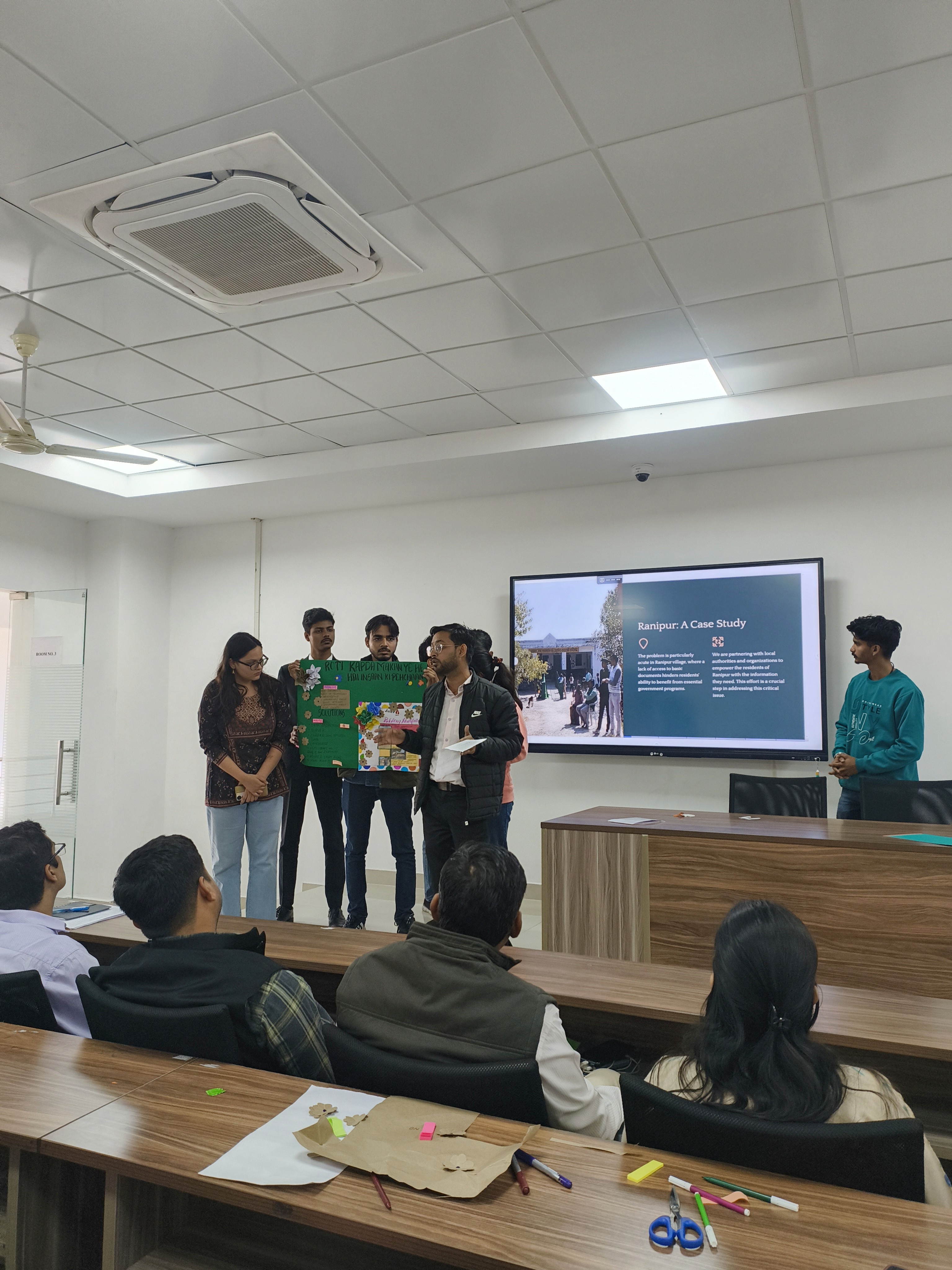 Participants presenting their ideas at one of Awaaz's workshops