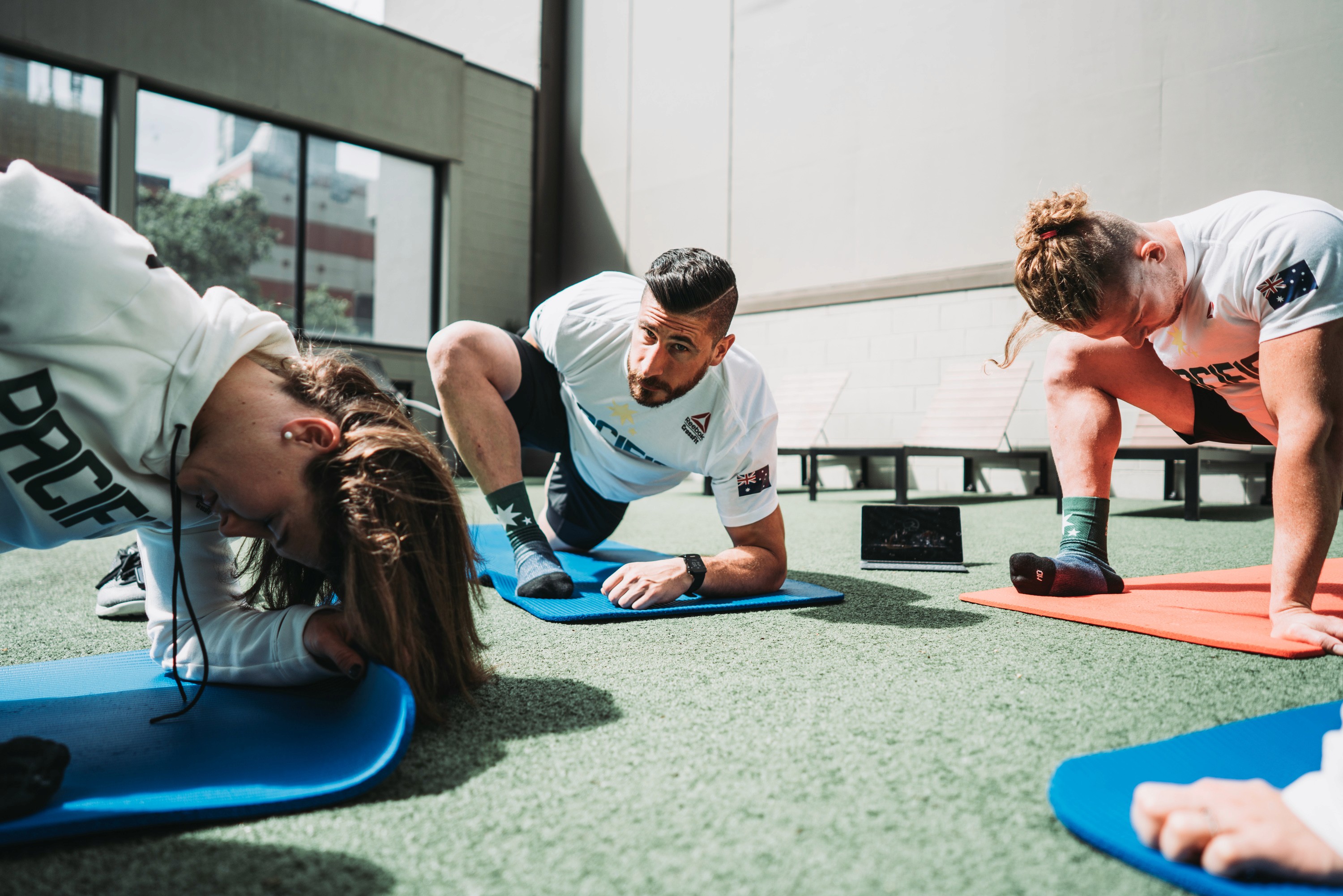 group excercises - Benefits of a Workplace Wellness Program 
