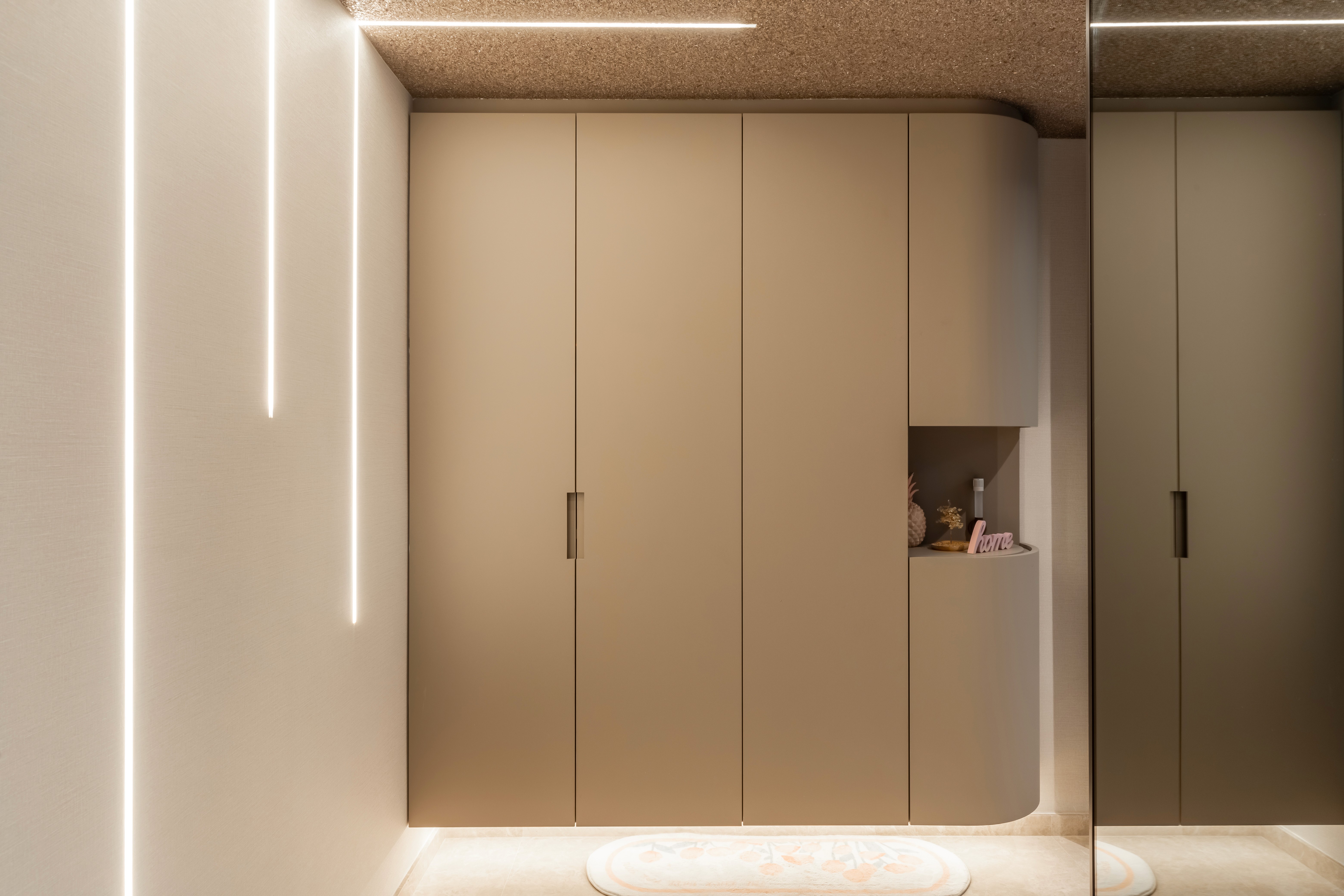 Modern curved staircase with warm ambient lighting