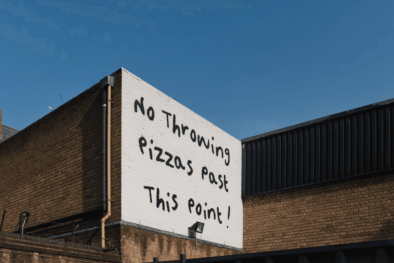 Freshly baked pizzas being prepared at Peter Pizzeria