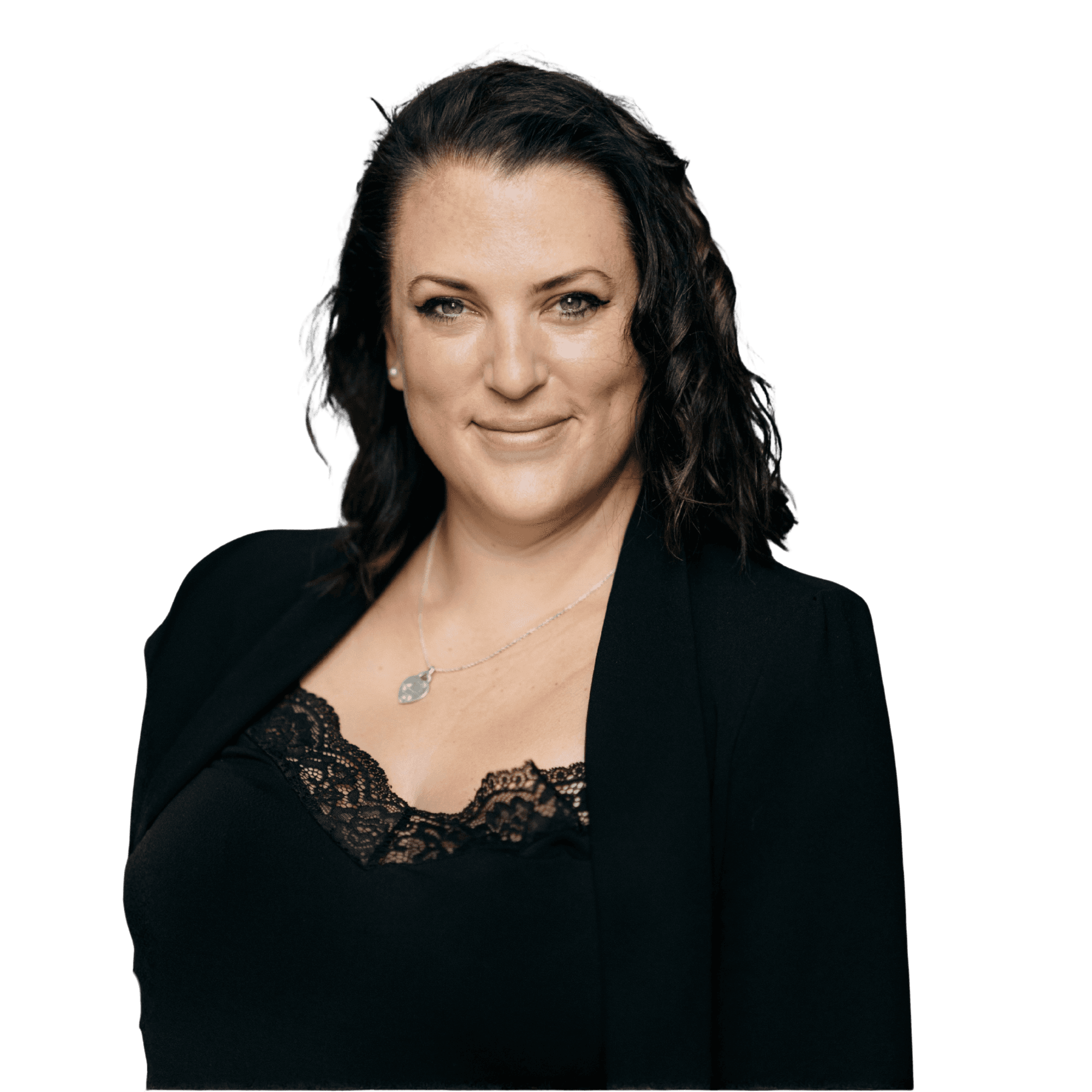 Close-up of a tree stump showing growth rings and a textured brown wood surface.