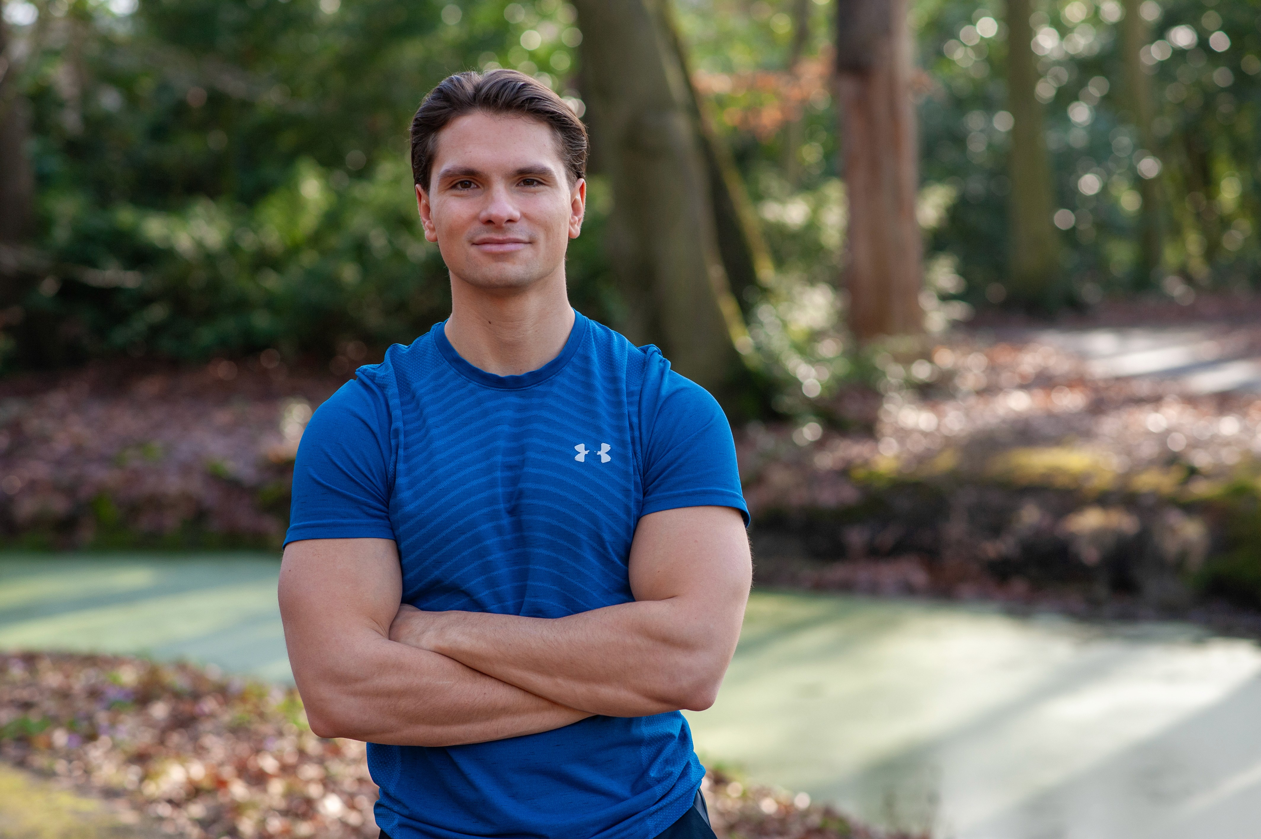 Rachel Stone, personal trainer and fitness coach, smiling in natural light
