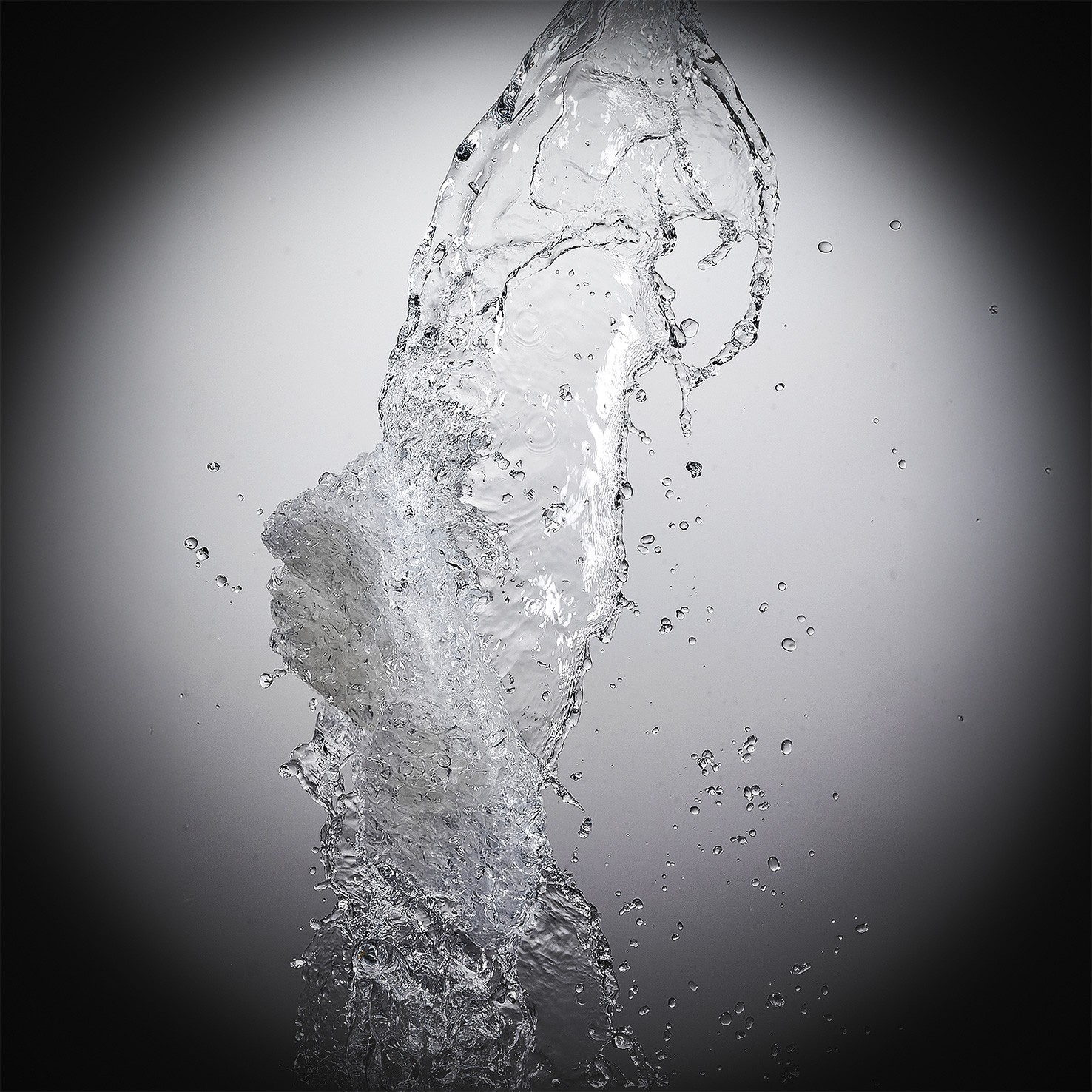 husband and wife working happily on a laptop