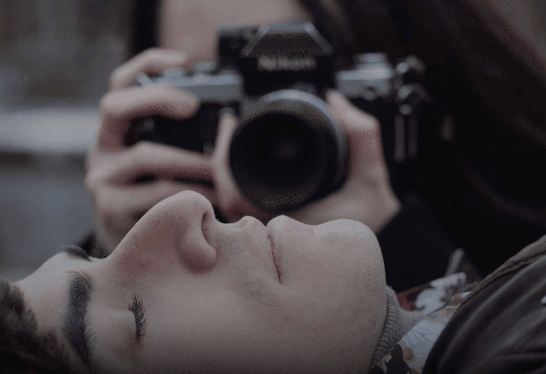 Historic storefronts line a charming small-town street.