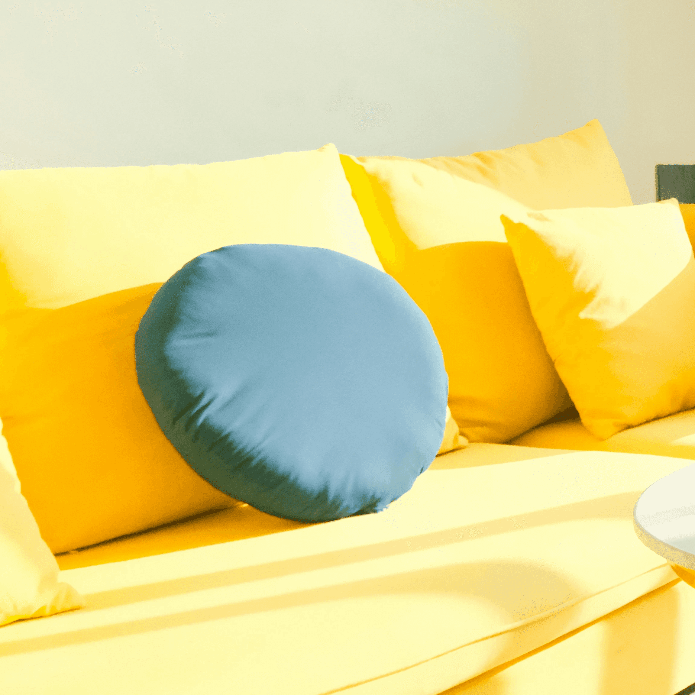 a living room filled with furniture and a large window