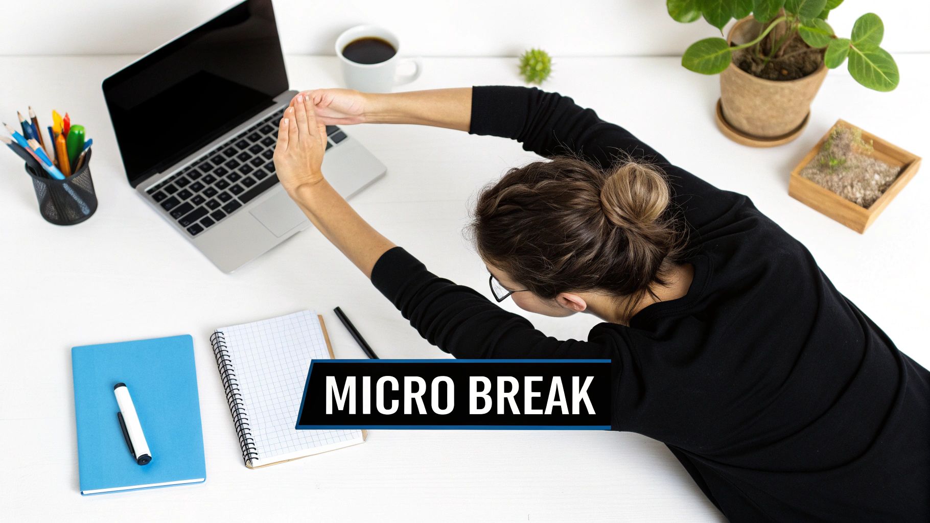 Person stretching at their desk