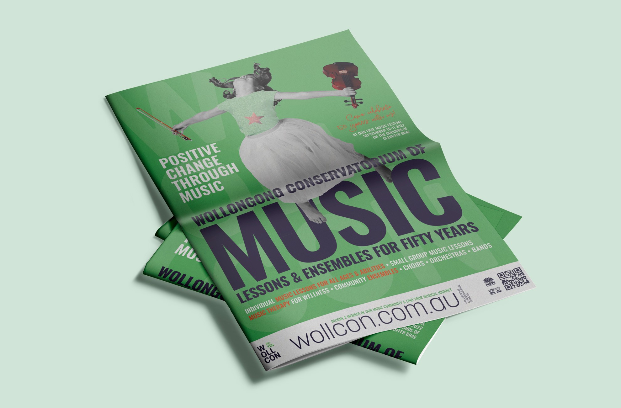 WollCon newspaper advertisement design featuring brand design.