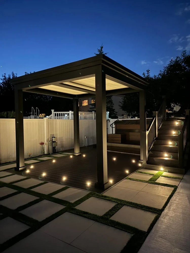 Custom Trex Composite backyard deck with electrical louvered pergola in Bergen Beach, Brooklyn, NYC