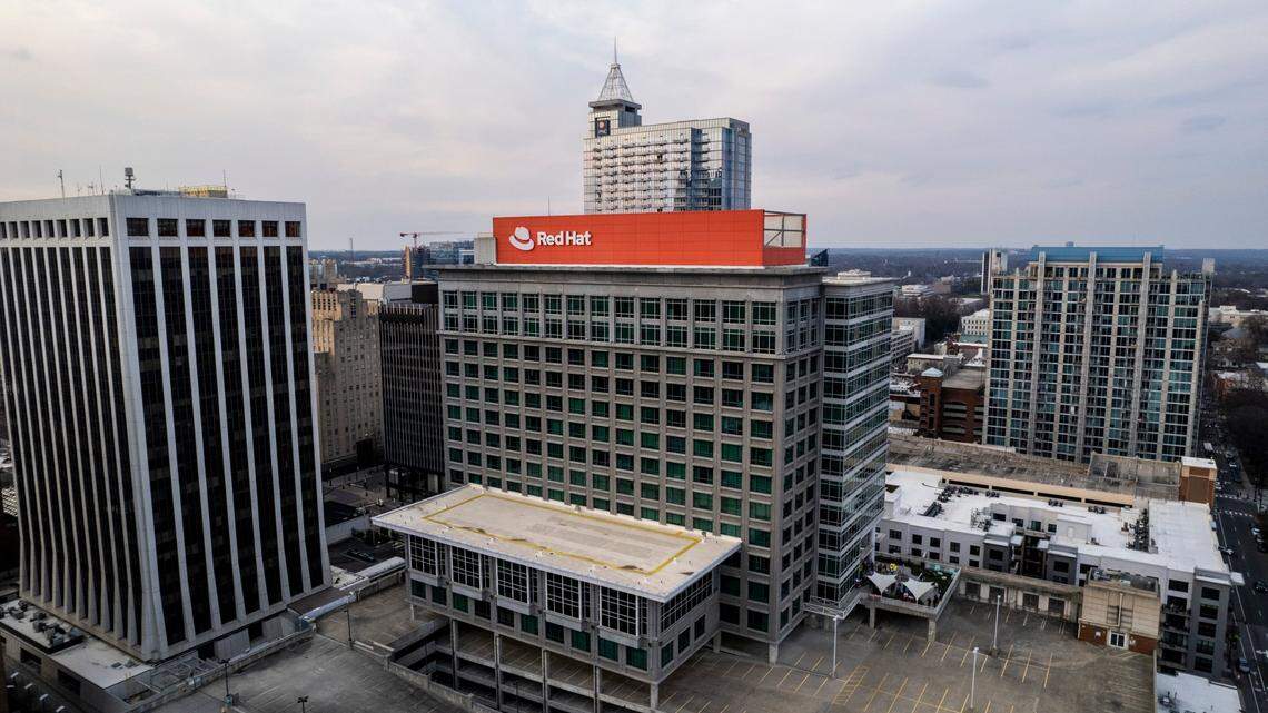 The Red Hat building shown from the air, with surrounding building around it.