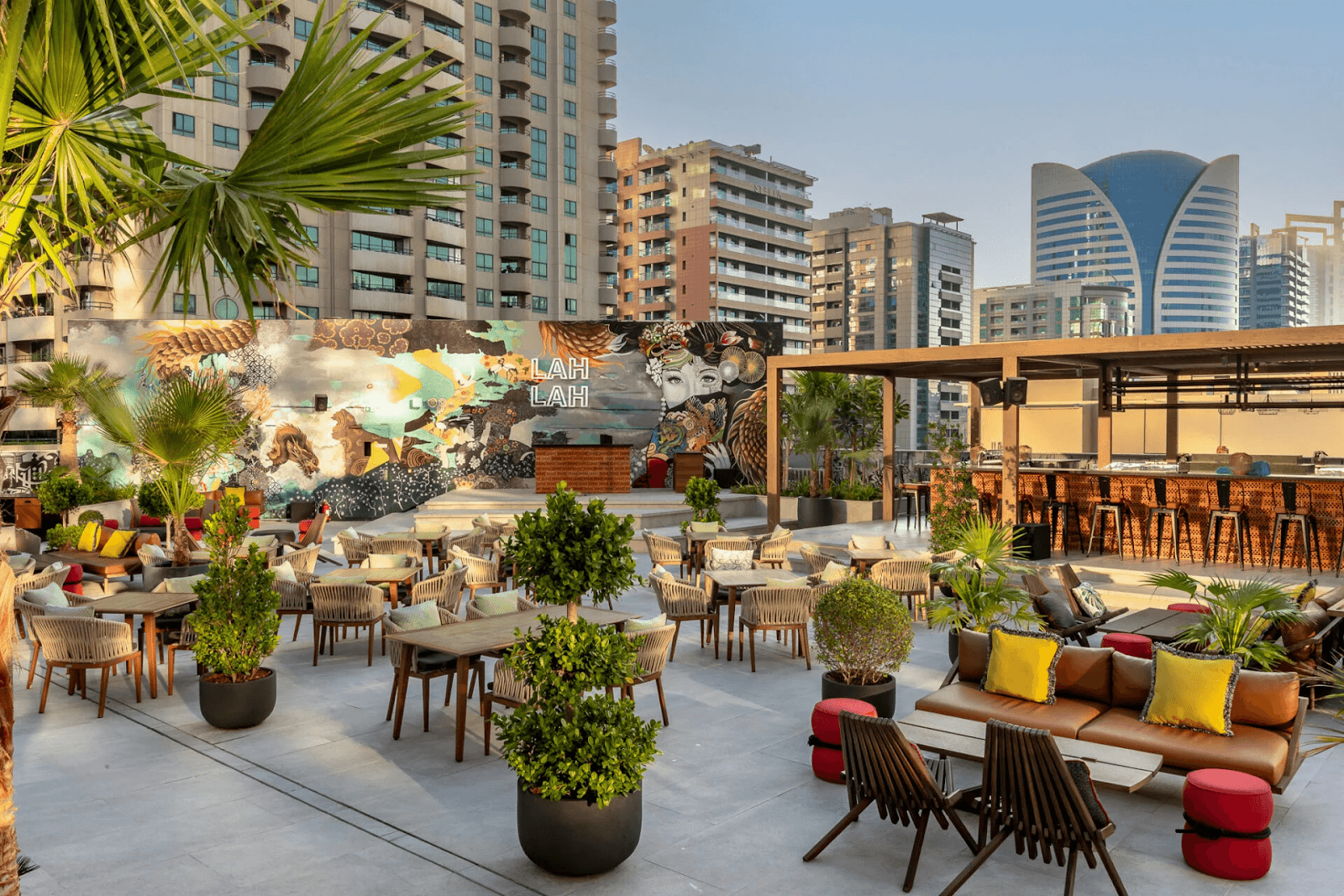 Outdoor rooftop seating at Lah Lah, a pet-friendly restaurant in Zabeel House.