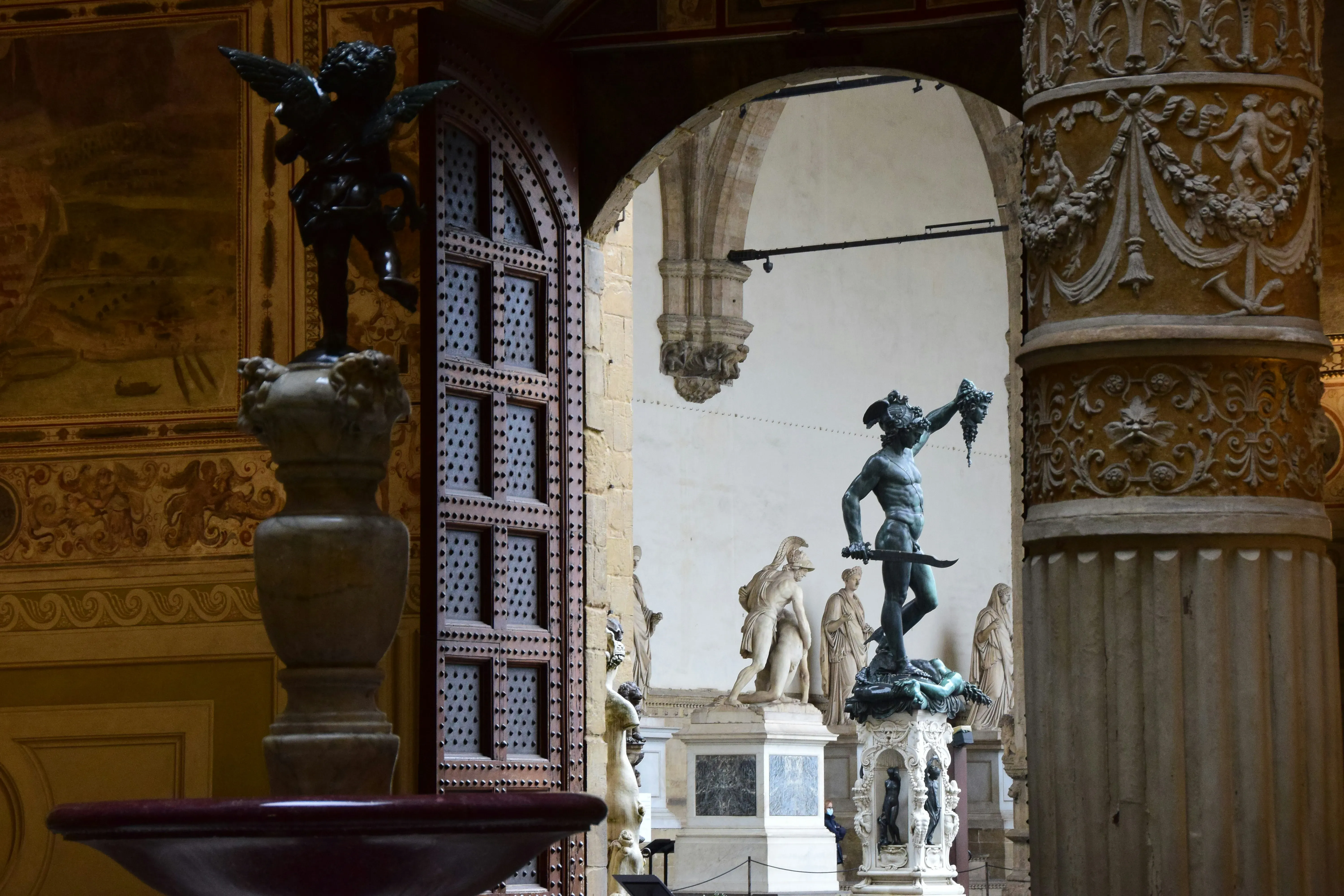 black statue of man and woman