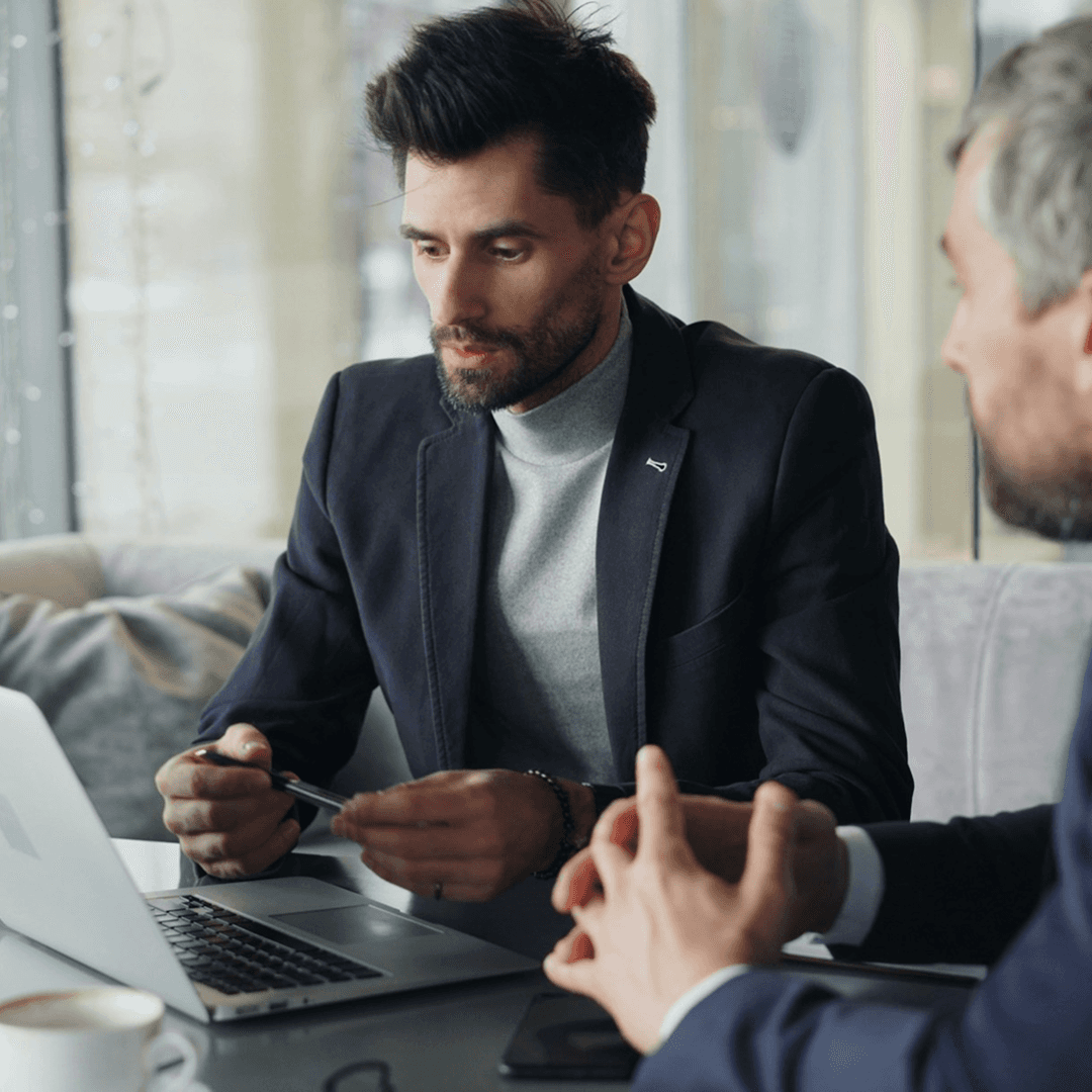 Abstract image with vibrant pink, red, and orange hues blending into soft, flowing shapes. The ethereal atmosphere conveys warmth and movement.