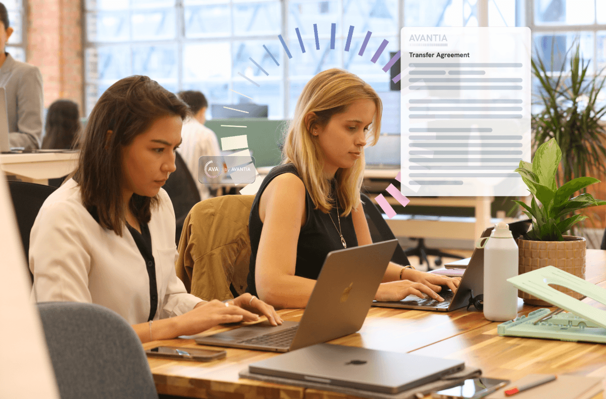 Legal professional reviewing documents on a large monitor, with on-screen highlights representing automated document review and insights.